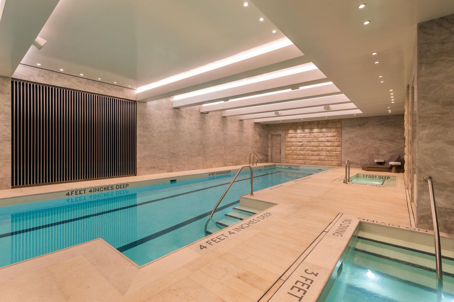 a view of a hallway with chairs