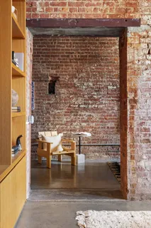 a room with table and chairs