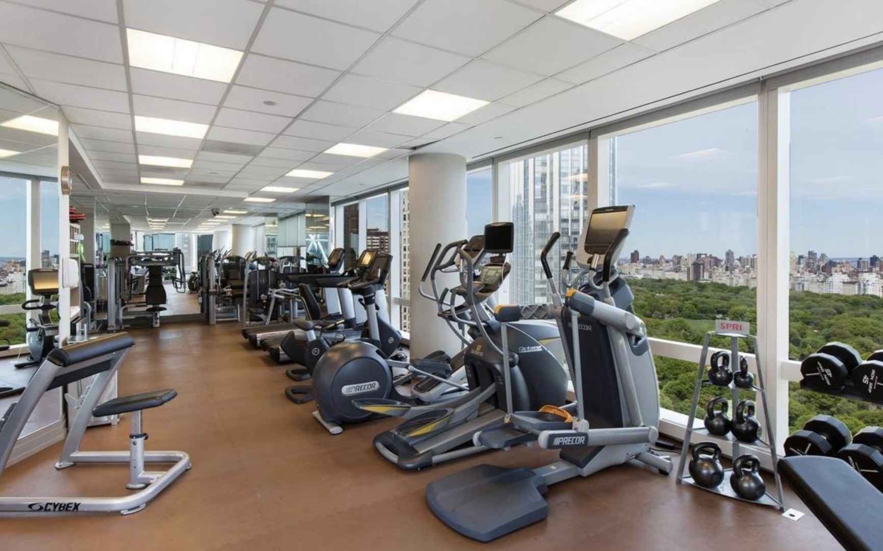 25 Columbus Circle, Unit 59F Manhattan, NY 10019 - Photo 8 of 15 a view of a room with gym equipment