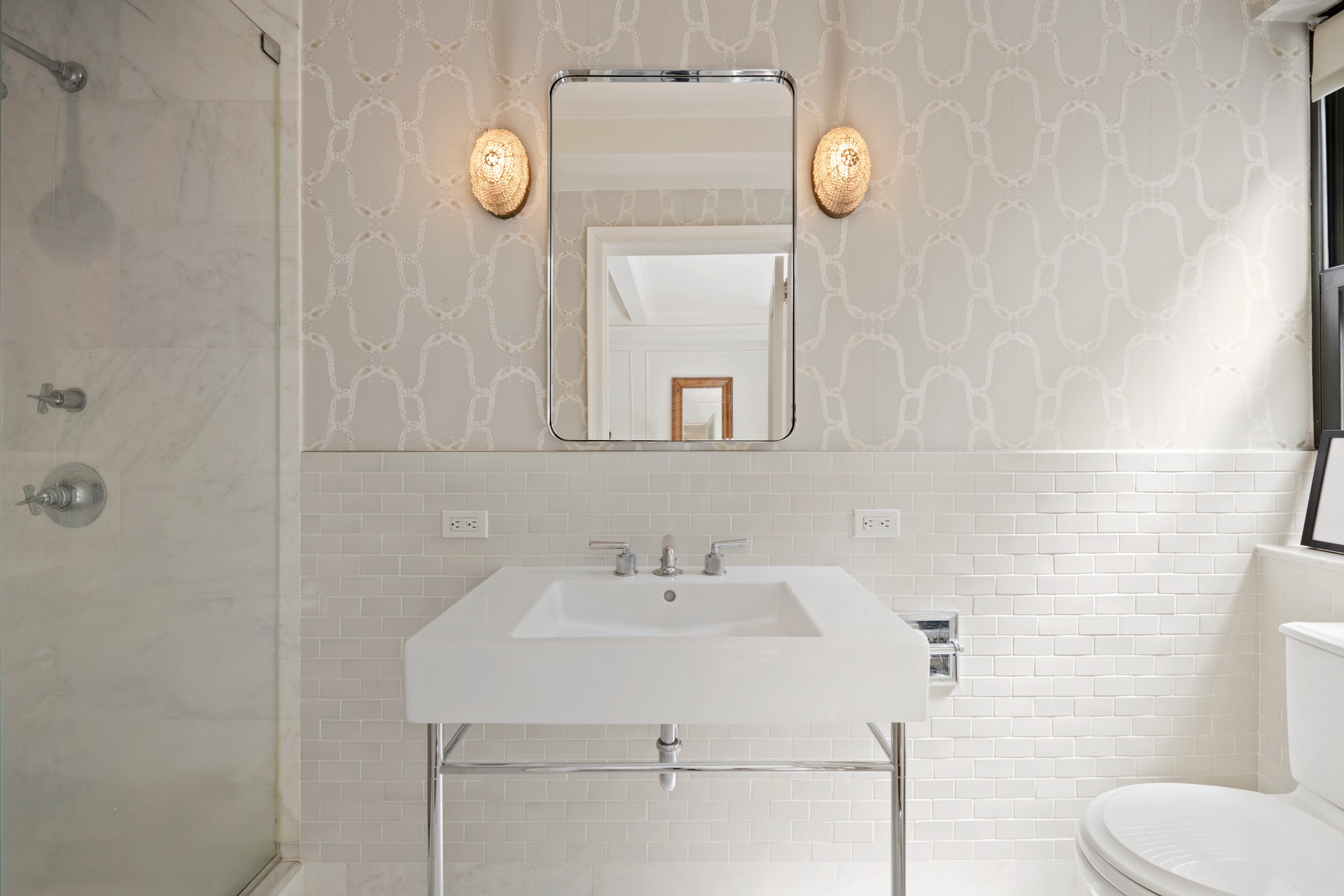 225 East 79th Street, Unit 3A Manhattan, NY 10075 - Photo 6 of 10 a bathroom with a toilet and a sink