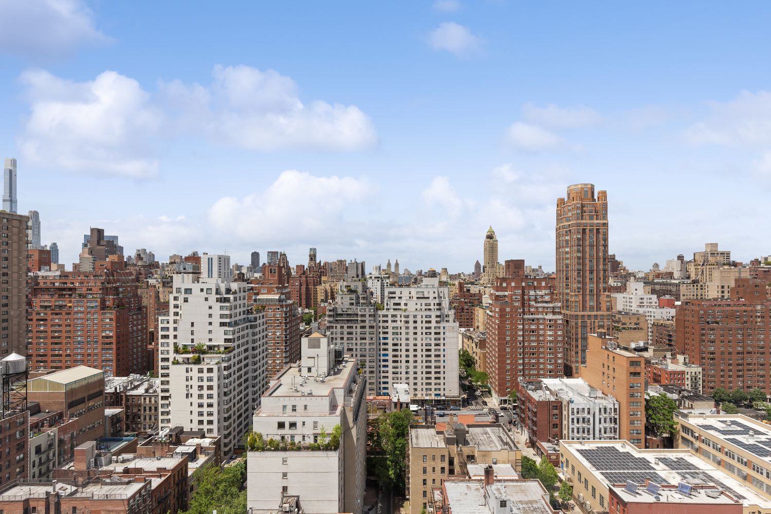 255 East 74th Street, Unit 20C Manhattan, NY 10021 - Photo 12 of 16 a view of a city with tall buildings