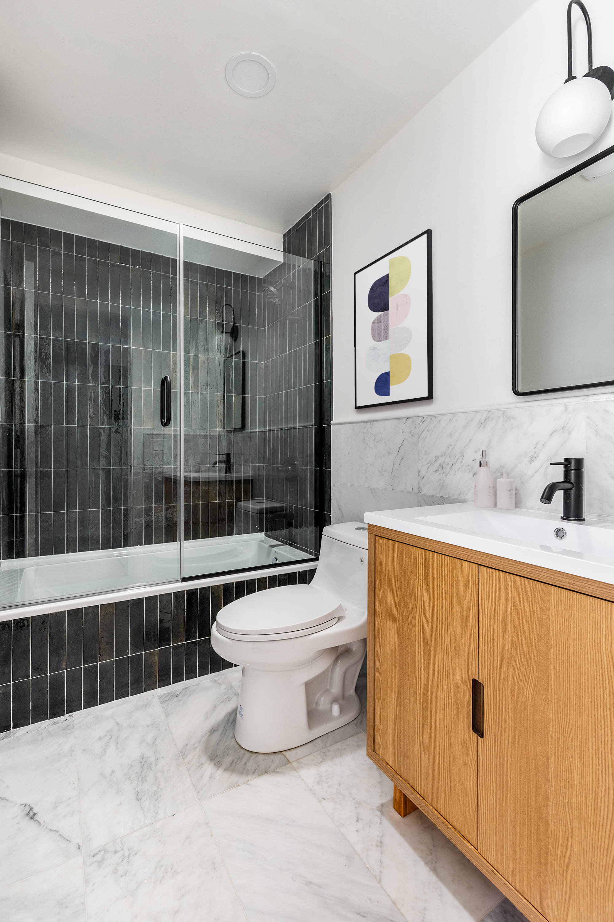 95 Moffat Street Brooklyn, NY 11207 - Photo 14 of 18 a bathroom with a sink a toilet and shower