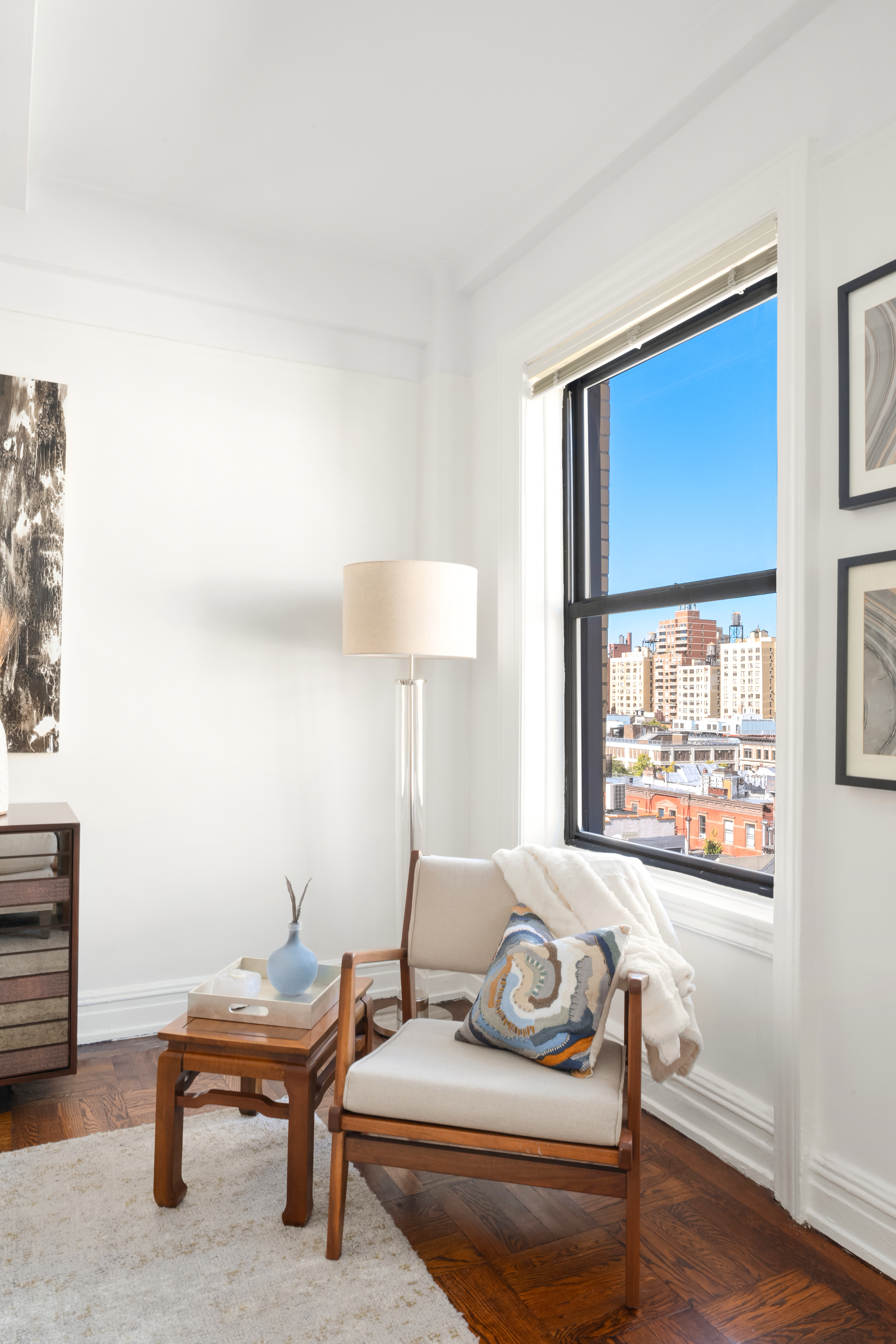 41 West 82nd Street, Unit 9D Manhattan, NY 10024 - Photo 2 of 15 a living room with furniture and a window