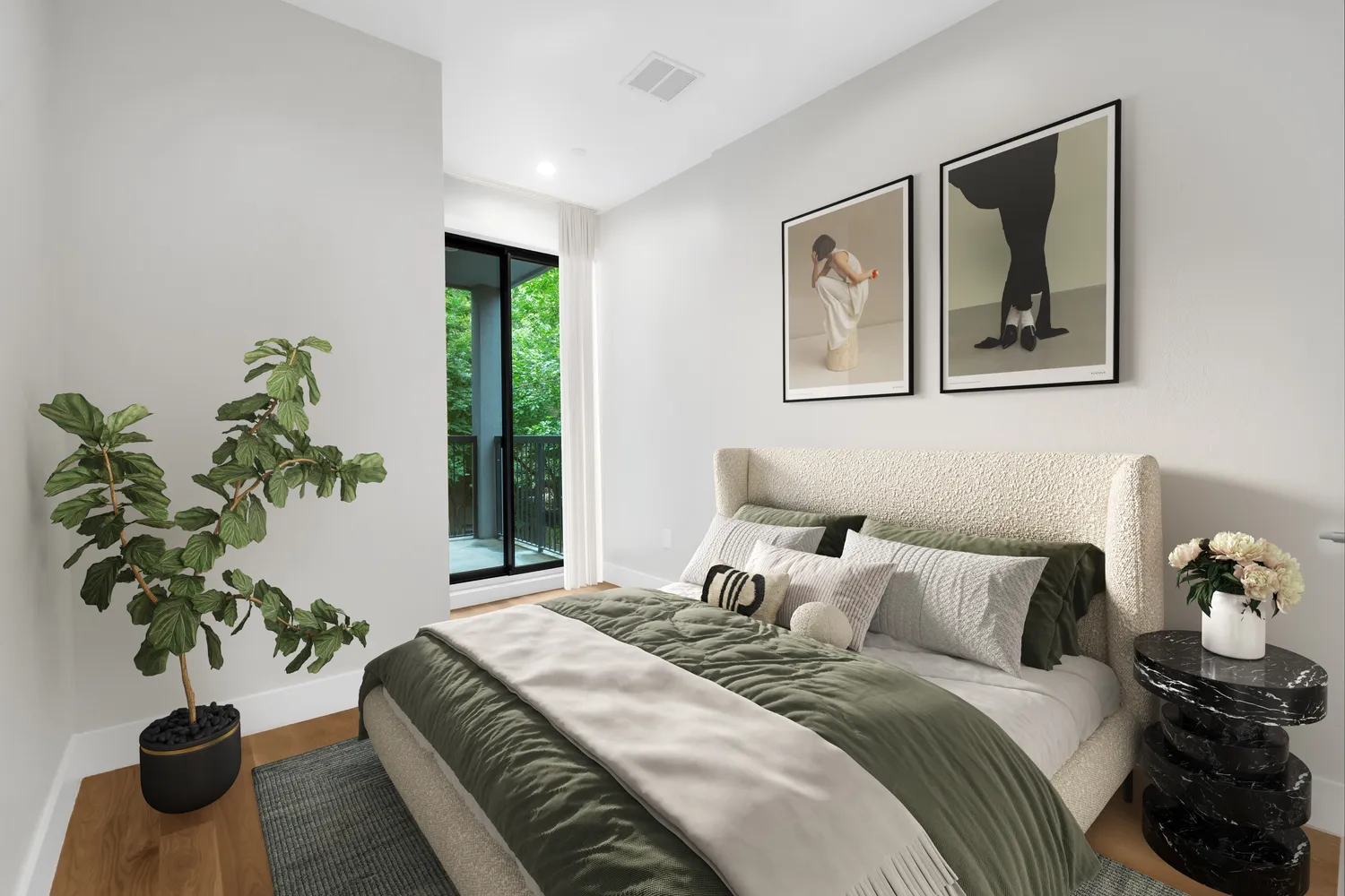 a bedroom with a bed and a plant