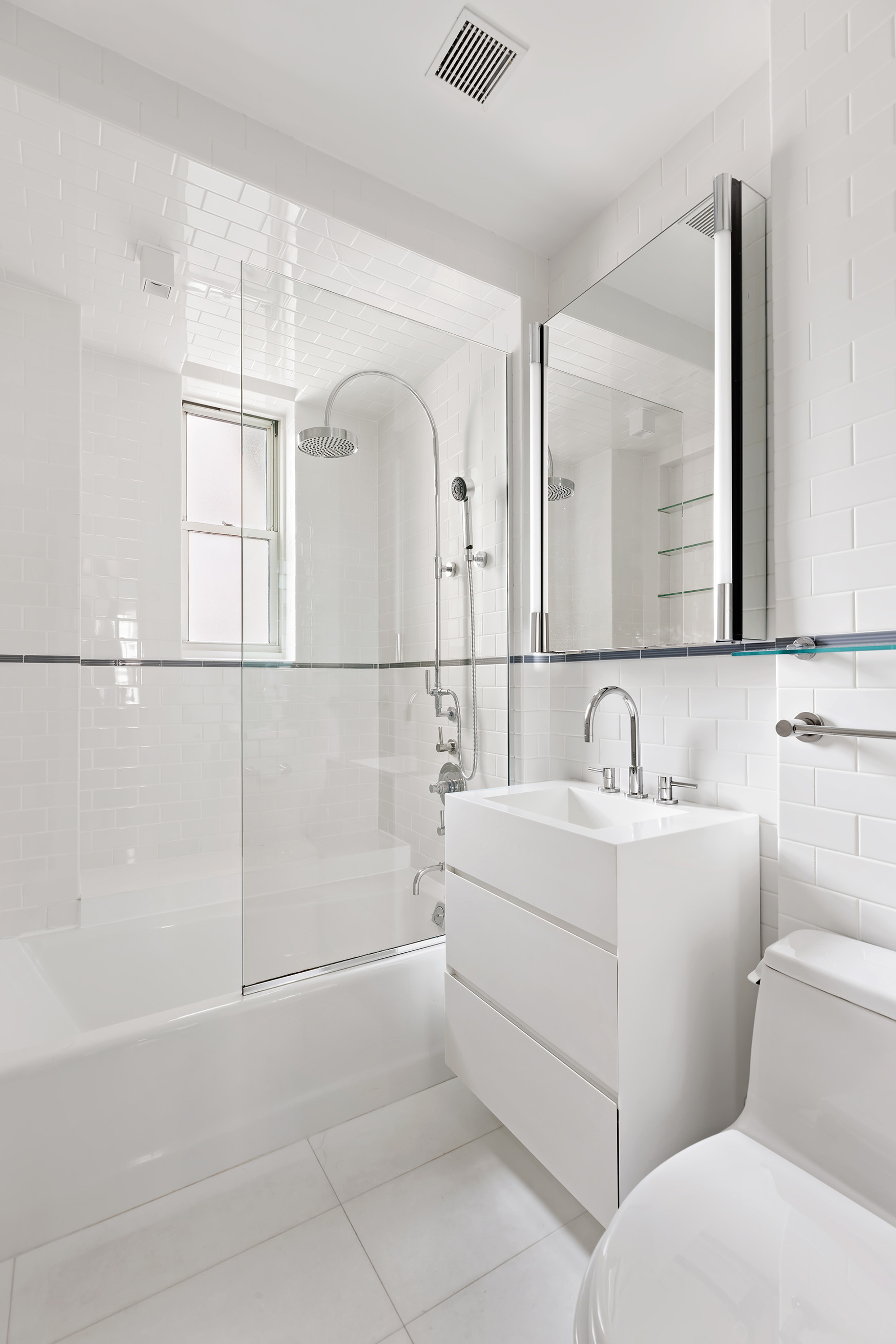 863 Park Avenue, Unit 8W Manhattan, NY 10075 - Photo 11 of 15 a bathroom with a sink and a mirror