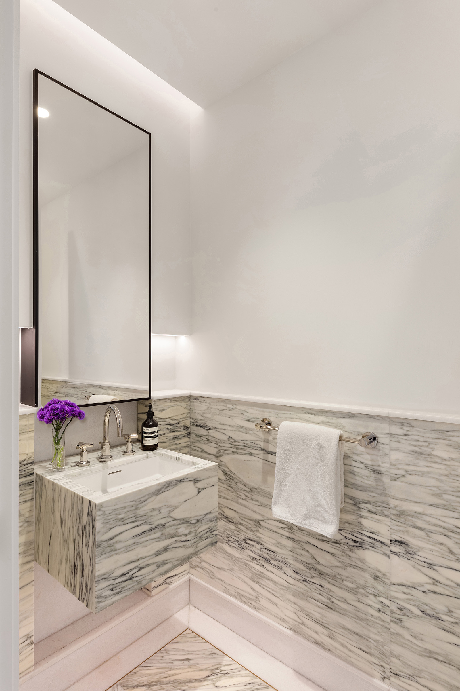 500 West 18th Street, Unit EAST 19E Manhattan, NY 10011 - Photo 12 of 18 a bathroom with a sink and a mirror