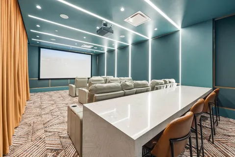 a large white kitchen with a large window