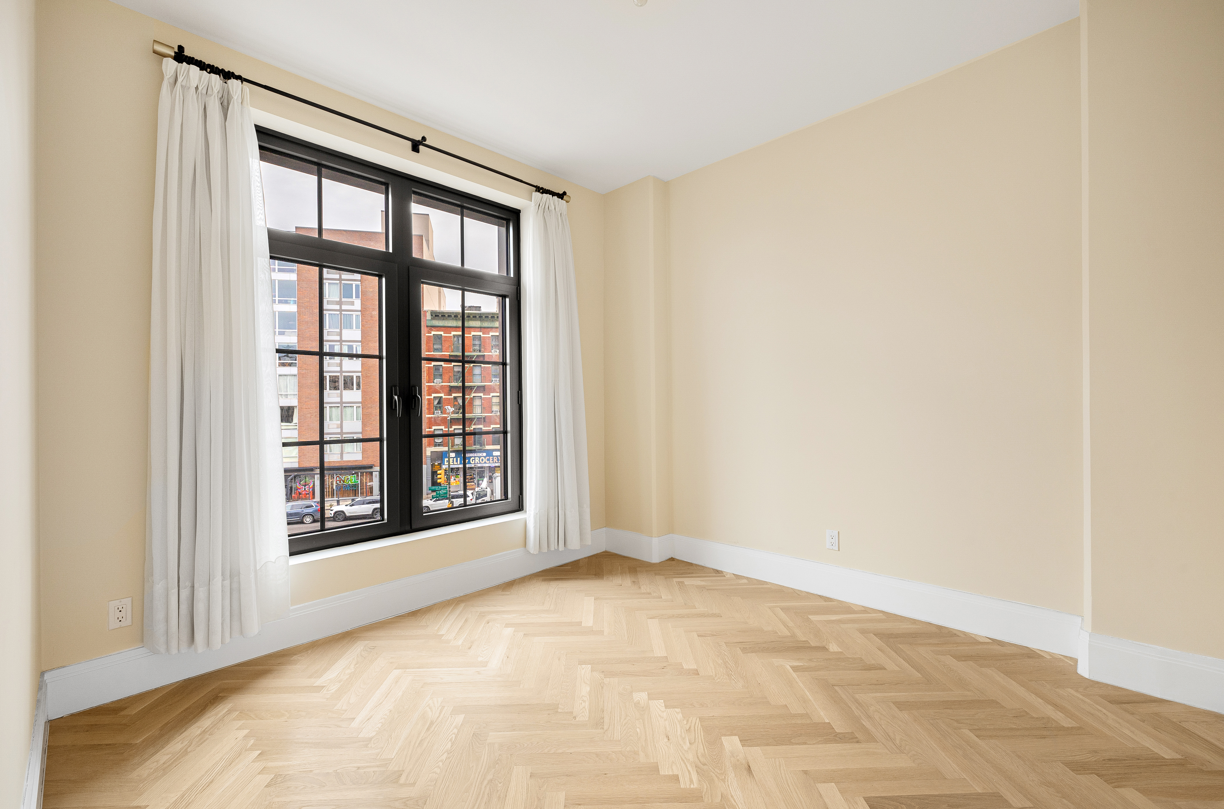 300 West 122nd Street, Unit 4F Manhattan, NY 10027 - Photo 9 of 32 a view of an empty room with a window
