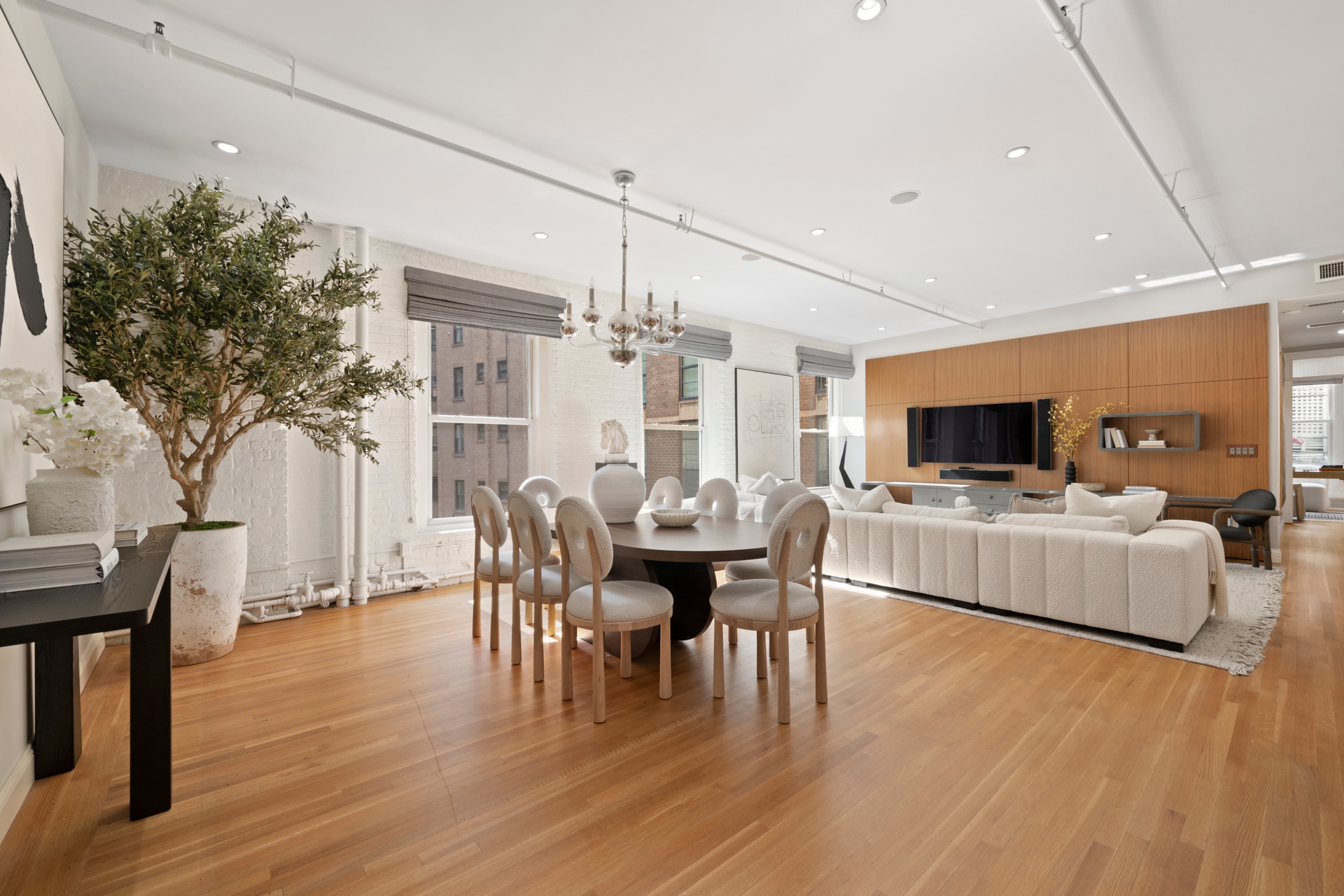 30 West 13th Street, Unit 4C Manhattan, NY 10011 - Photo 2 of 22 a view of a dining room with furniture window and wooden floor
