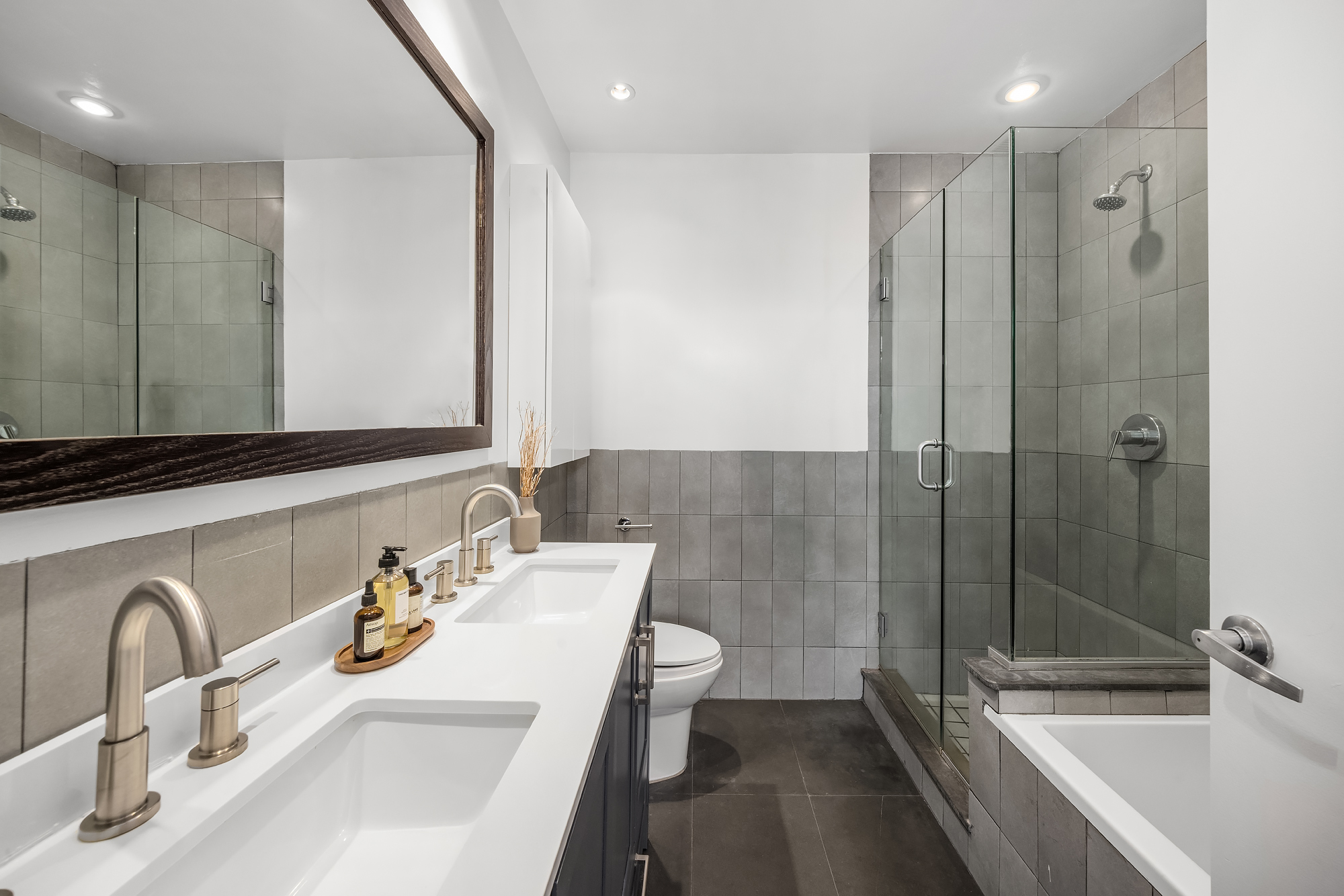 82 Guernsey Street, Unit 2A Brooklyn, NY 11222 - Photo 10 of 16 a bathroom with a sink and a tub