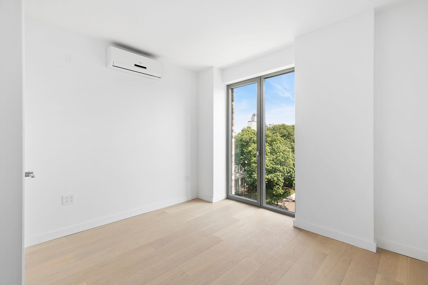 567 Ocean Avenue, Unit B504 Brooklyn, NY 11226 - Photo 4 of 8 a view of a room that has a window in it