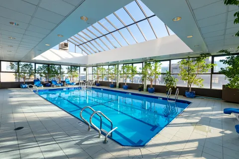 a lobby with furniture and outdoor view