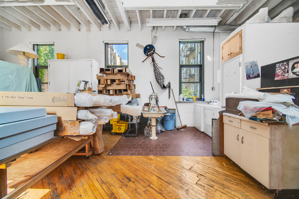 5-38 47th Road Queens, NY 11101 - Photo 4 of 14 a living room with furniture