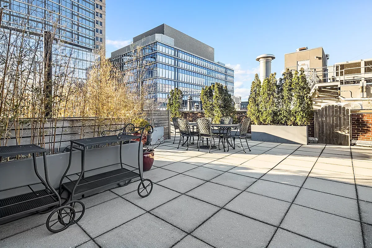 62 Beach Street, Unit 5E Manhattan, NY 10013 - Photo 14 of 15 a patio with table and chairs
