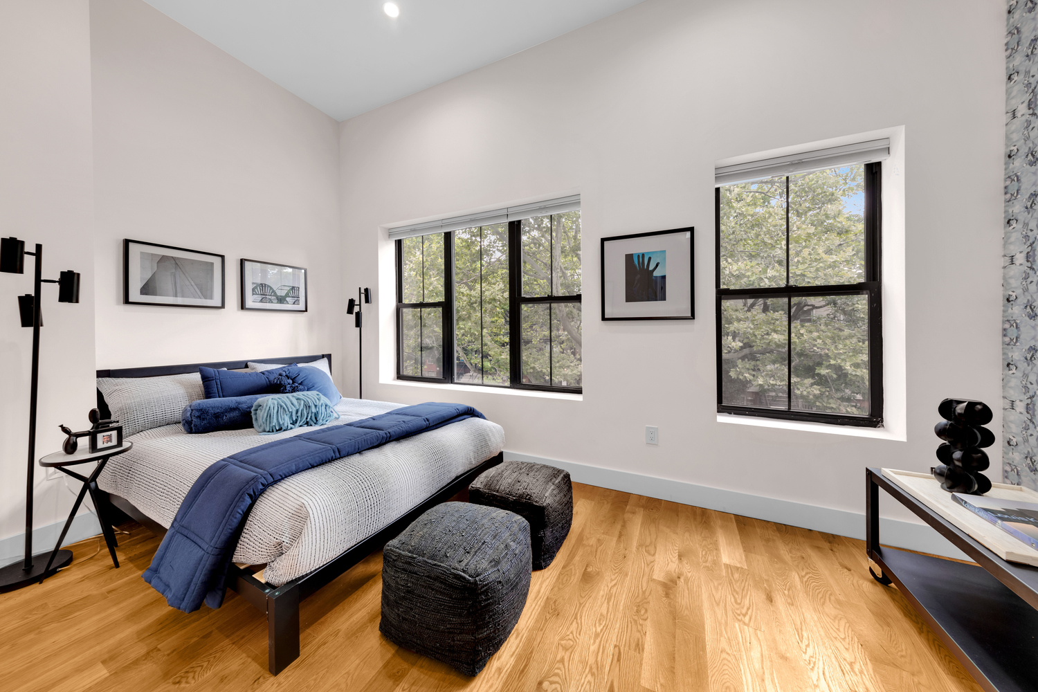 1118 Decatur Street Brooklyn, NY 11207 - Photo 10 of 18 a bedroom with a bed and a window