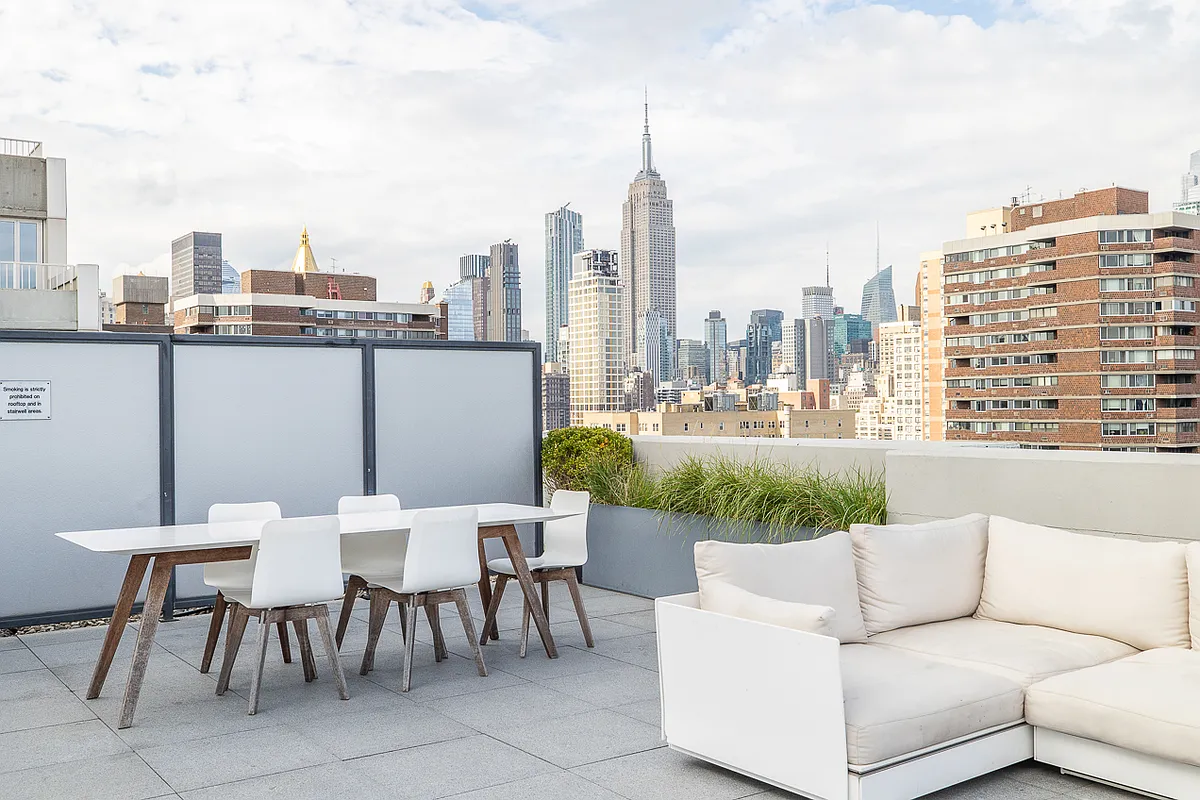 385 1st Avenue, Unit 10G Manhattan, NY 10010 - Photo 13 of 22 a view of balcony with furniture and outdoor space