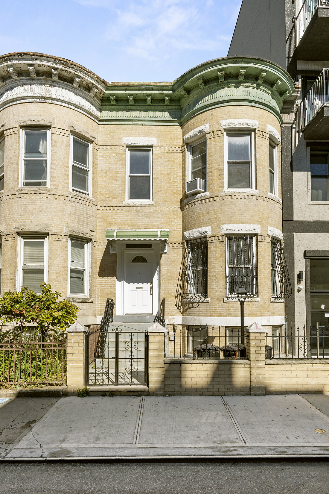 1437 Lincoln Place Brooklyn, NY 11213 - Photo 11 of 12 a front view of a house