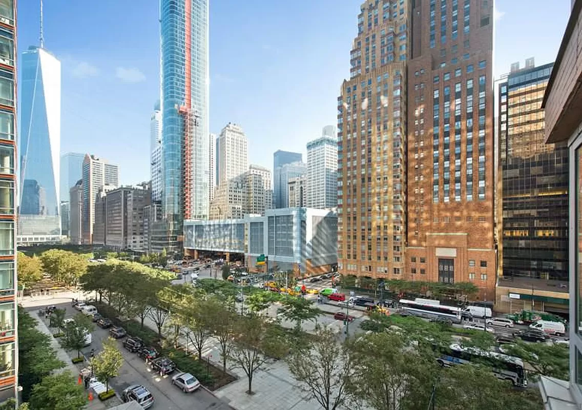 30 West Street, Unit 6B Manhattan, NY 10004 - Photo 2 of 13 a view of a city with tall buildings