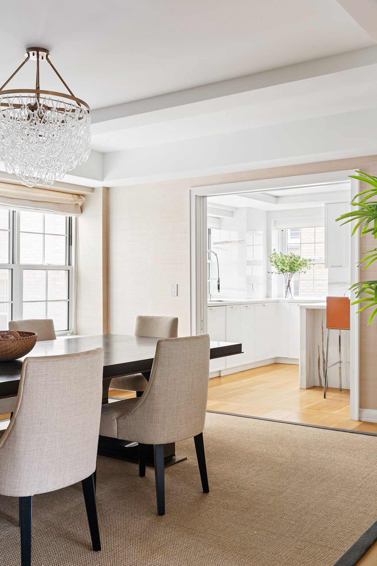 12 East 88th Street, Unit 8A Manhattan, NY 10128 - Photo 5 of 19 a view of a dining room with furniture and a window