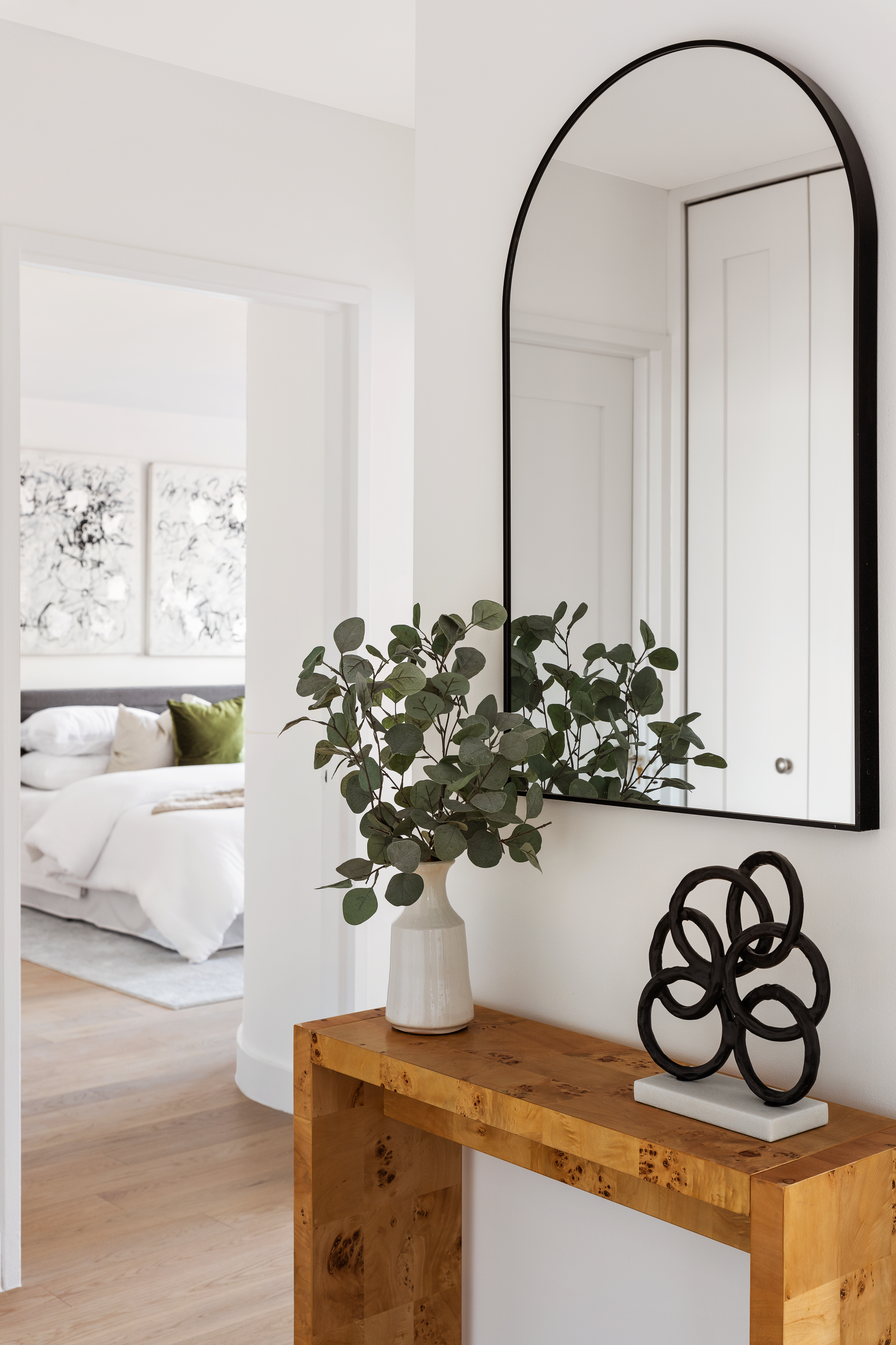 200 East 90th Street, Unit 12F Manhattan, NY 10128 - Photo 9 of 13 a table with a vase of flowers on it