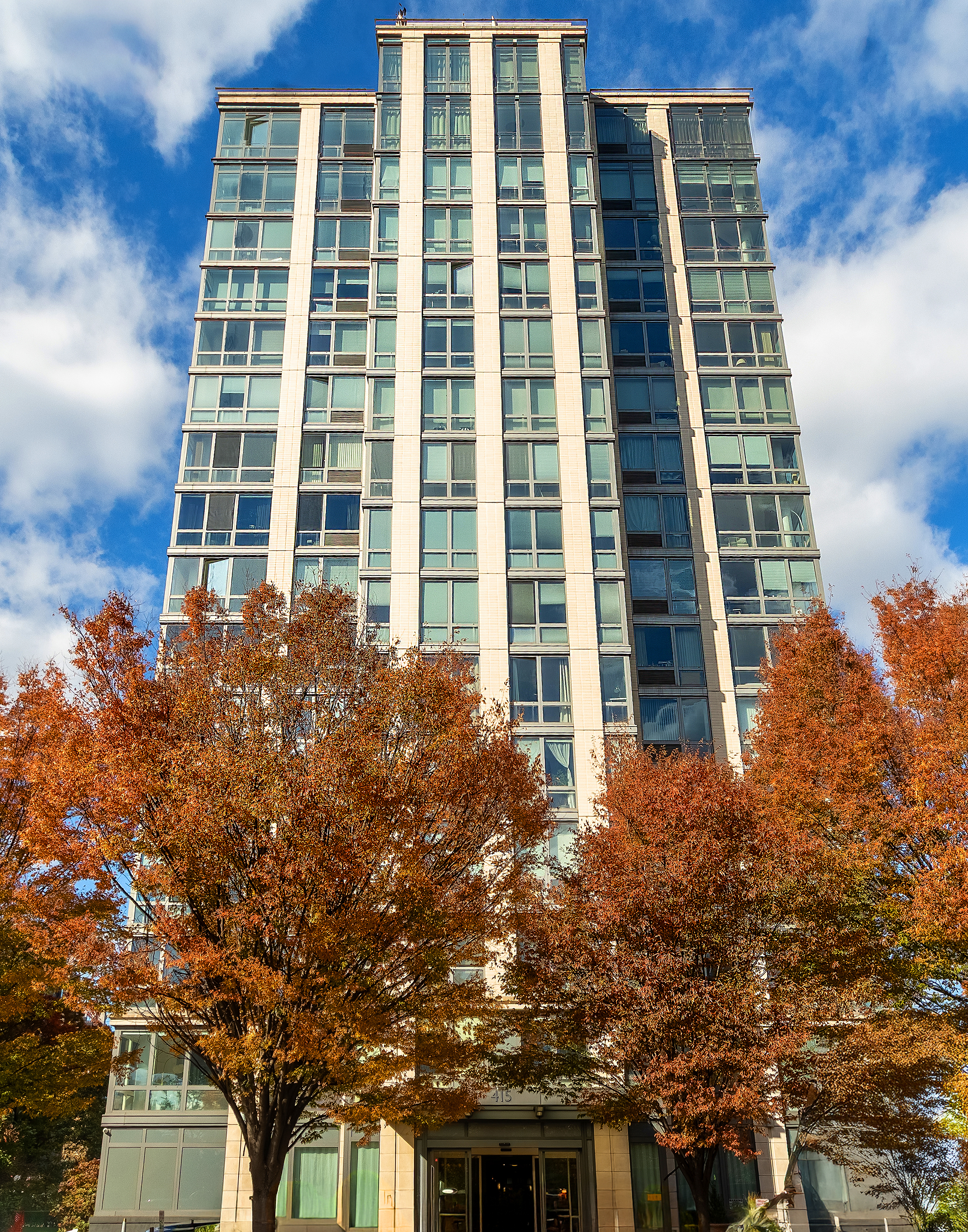 415 Main Street, Unit 7C Manhattan, NY 10044 - Photo 15 of 16 front view of a building