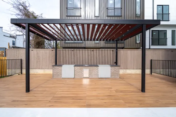 a view of a swimming pool with a patio