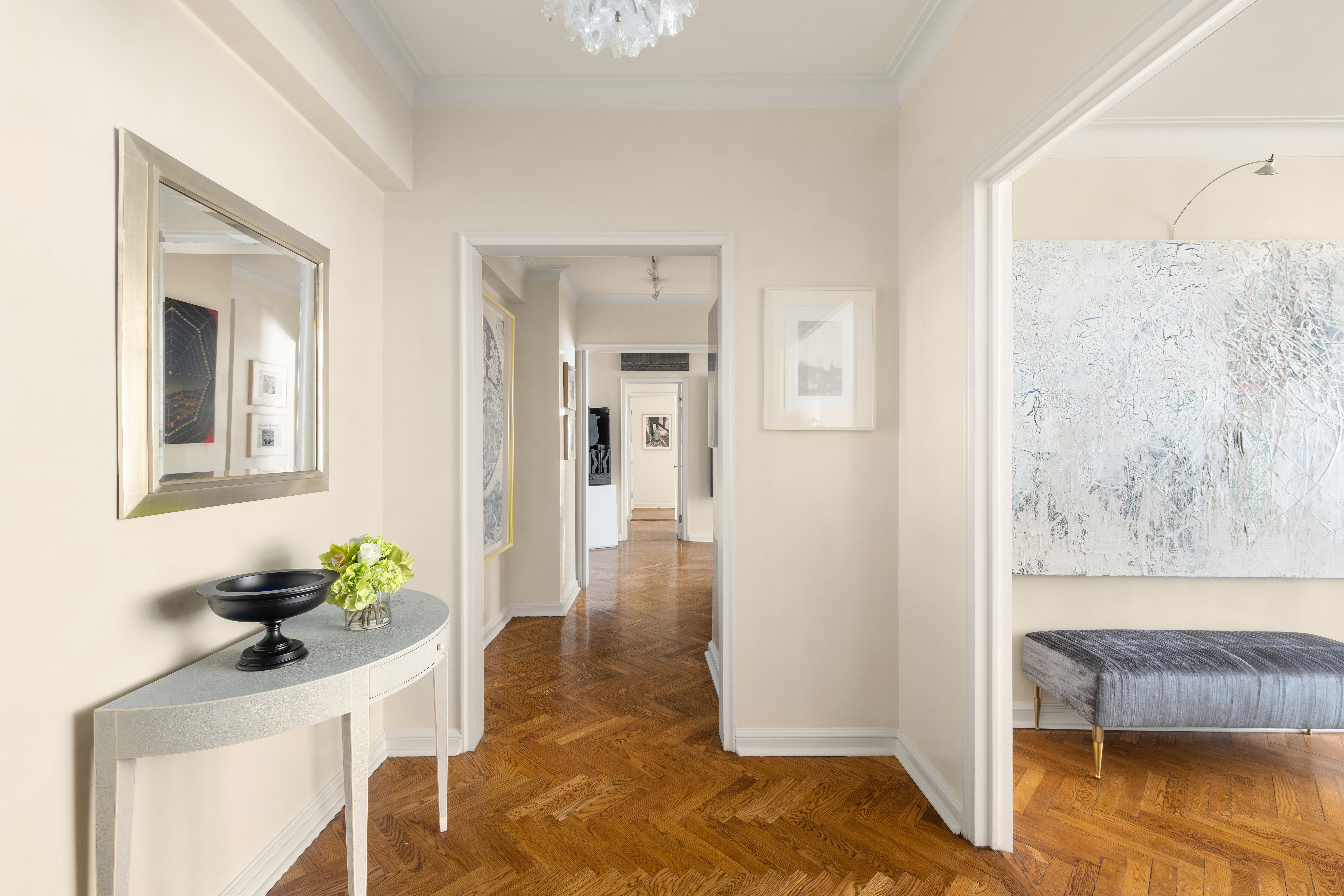 1 East 66th Street, Unit 9EF Manhattan, NY 10065 - Photo 10 of 19 a living room with furniture and a potted plant