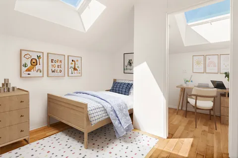 a bed room with a bed and a couch