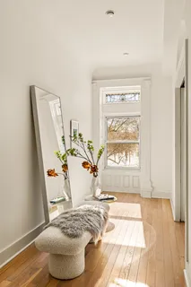 a view of entryway with wooden floor