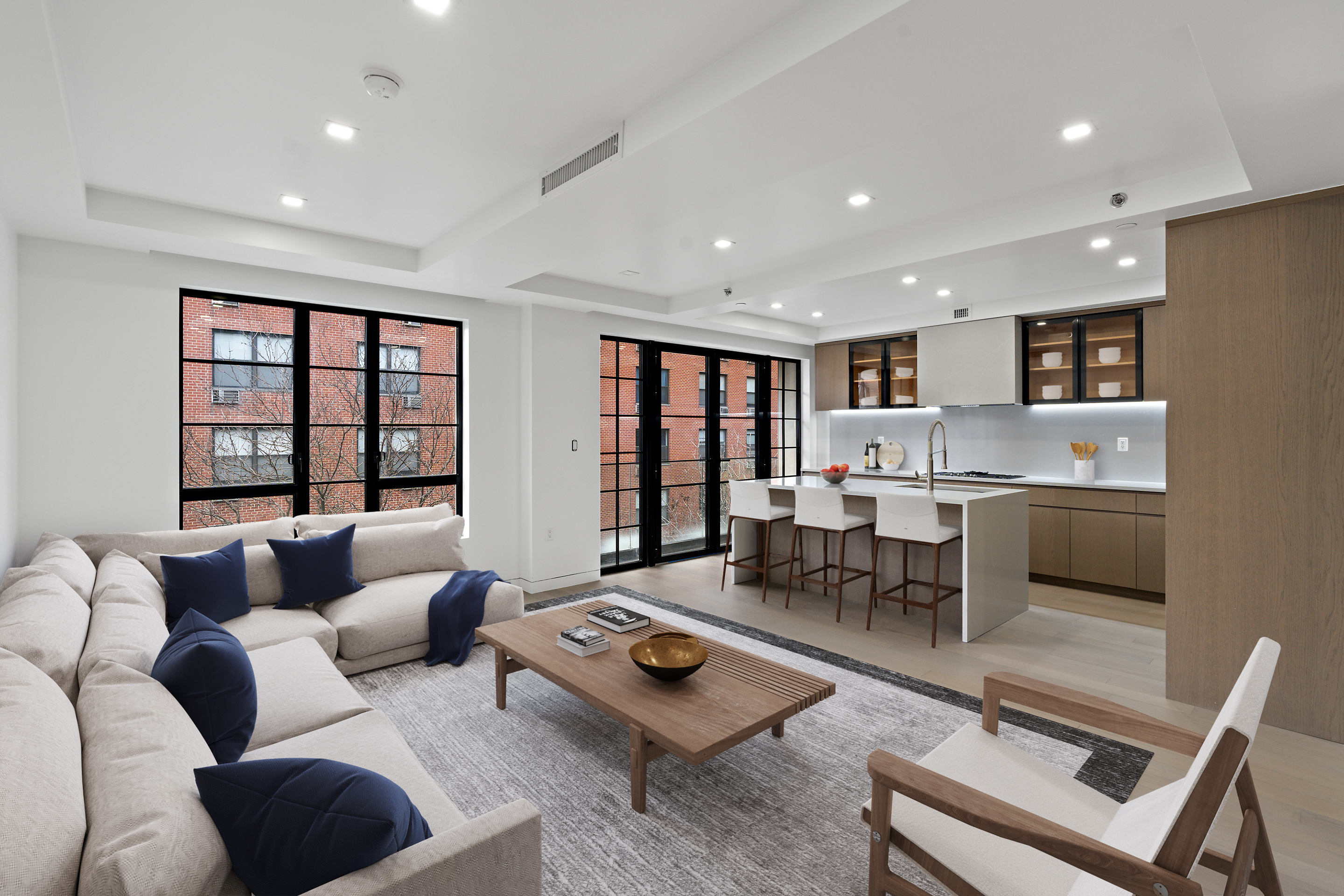 327 East 22nd Street, Unit 3A Manhattan, NY 10010 - Photo 3 of 14 a living room with furniture and a table