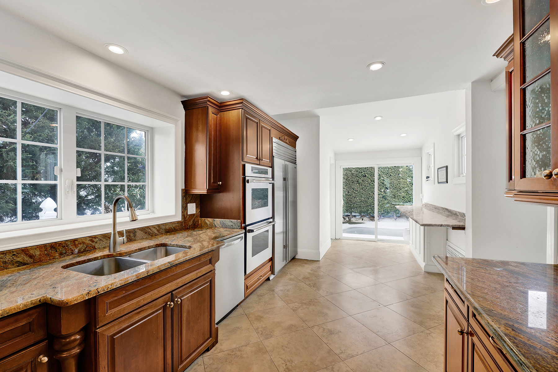 334 Beach 146th Street Queens, NY 11694 - Photo 15 of 21 a large kitchen with a sink and large window