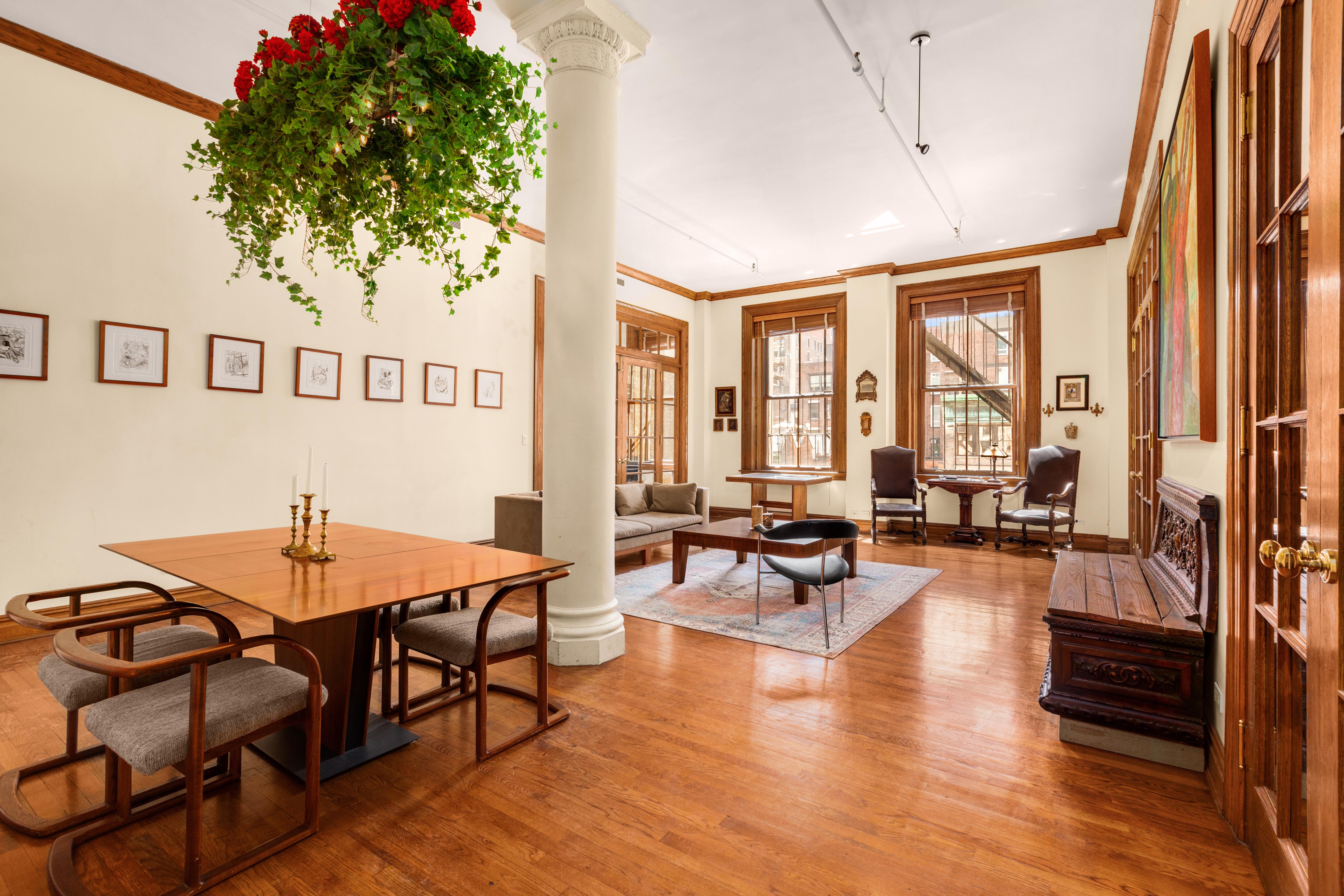 30 East 21st Street, Unit 6B Manhattan, NY 10010 - Photo 3 of 16 a dining room with furniture window and wooden floor