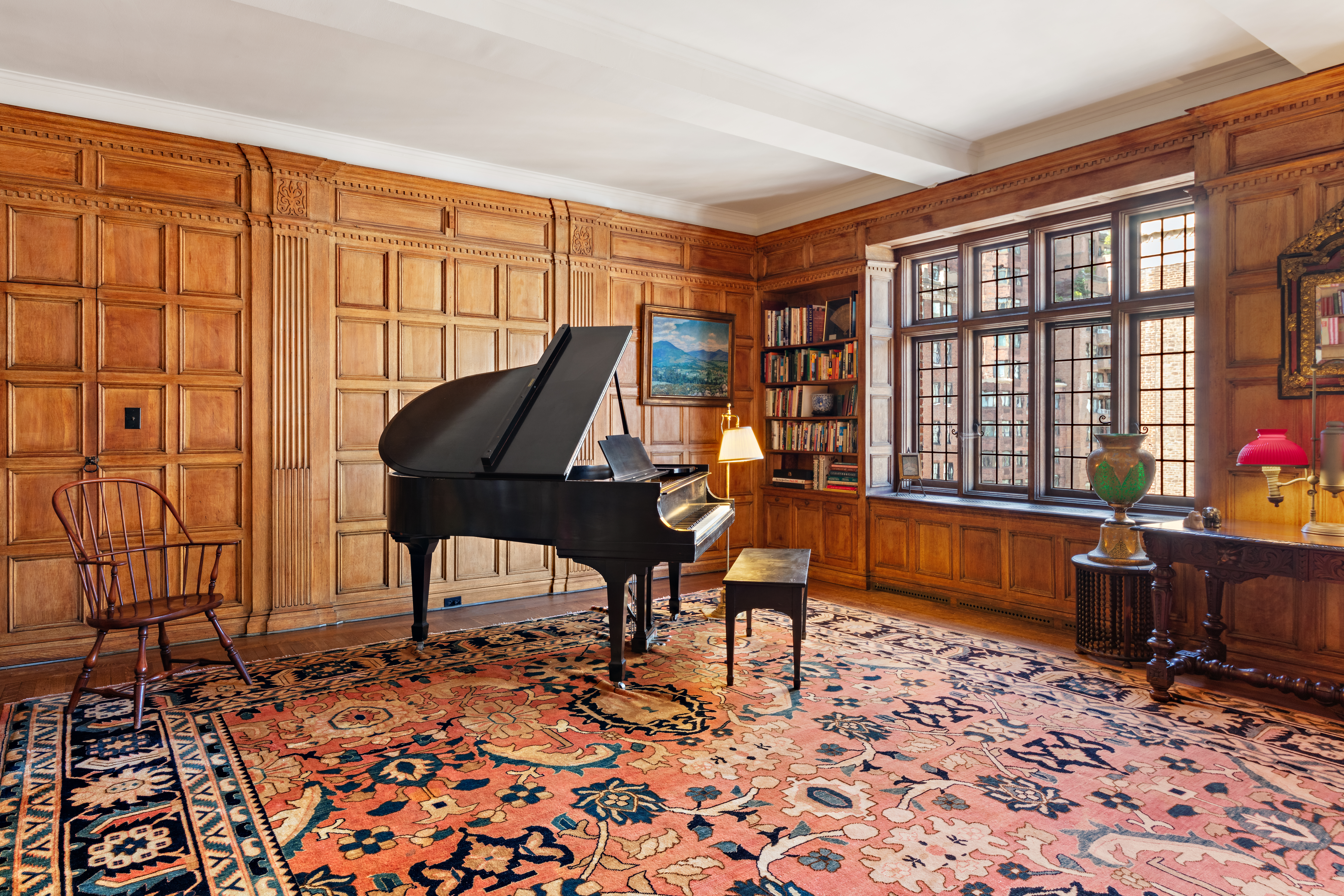 151 East 79th Street Manhattan, NY 10075 - Photo 2 of 15 a living room with furniture and a window
