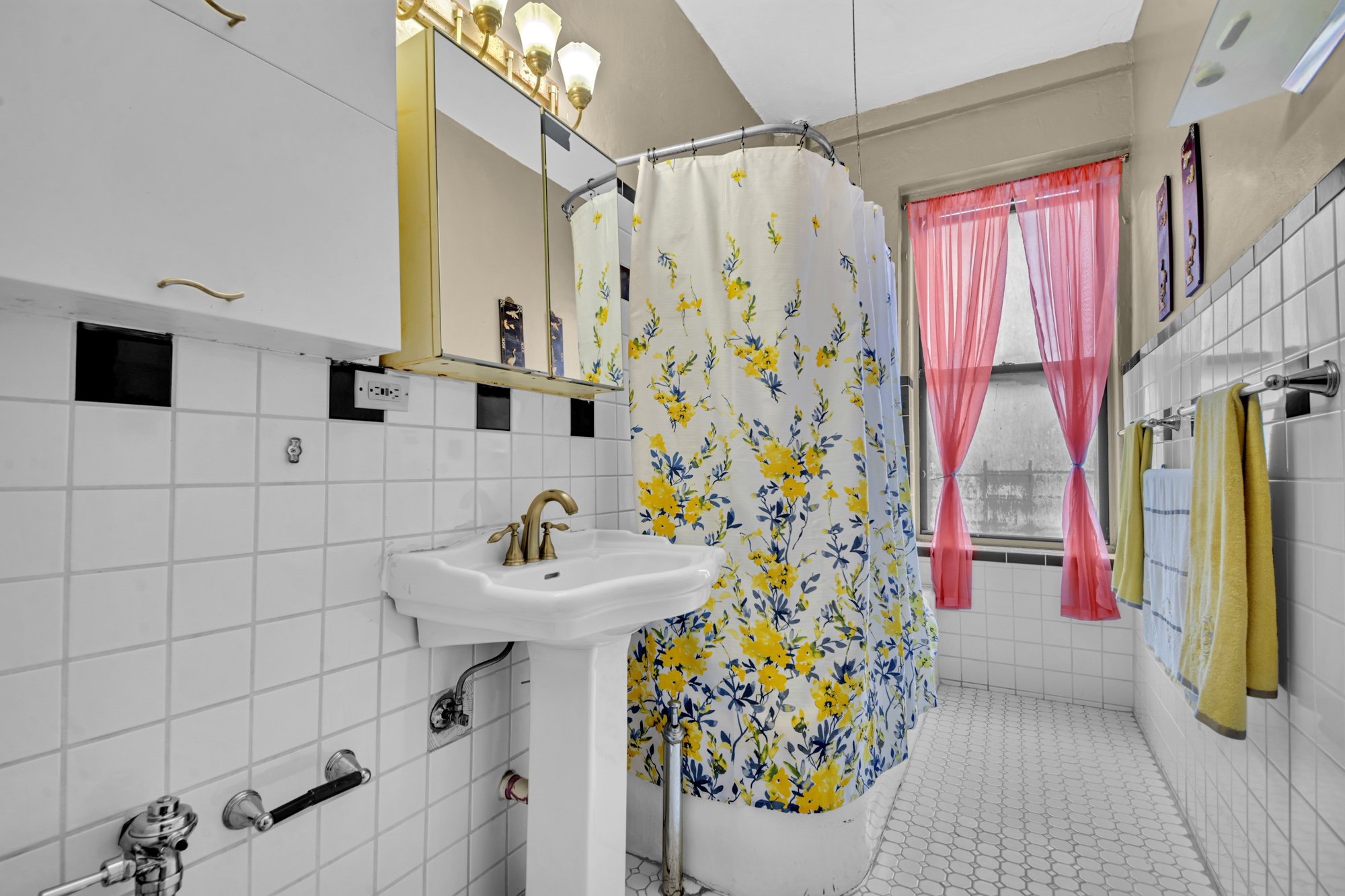 817 West End Avenue, Unit 6B Manhattan, NY 10025 - Photo 7 of 10 a bathroom with a sink and a mirror