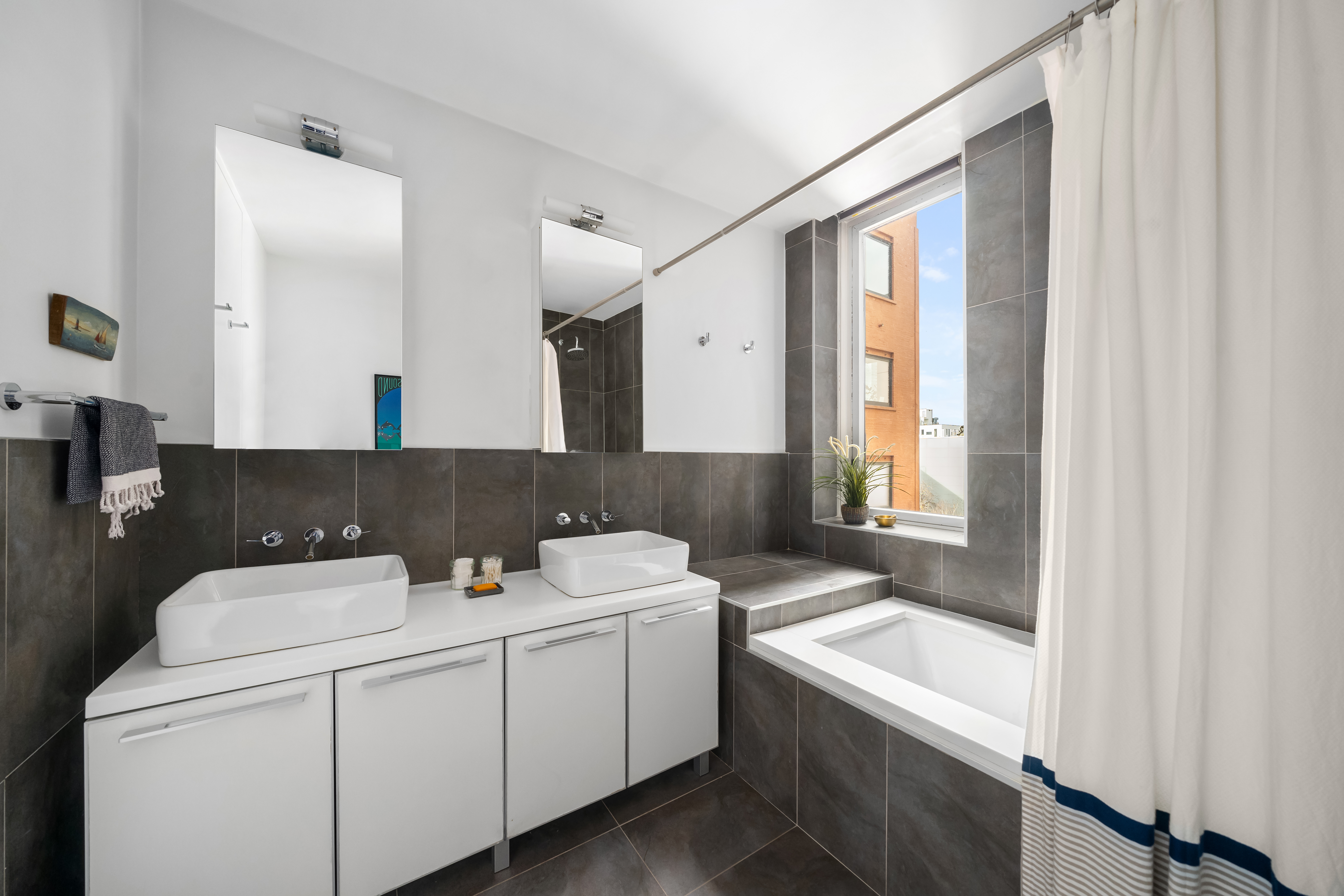 70 Berry Street, Unit 5G Brooklyn, NY 11249 - Photo 8 of 10 a utility room with dryer and washer