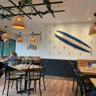 a kitchen with a sink cabinets and appliances