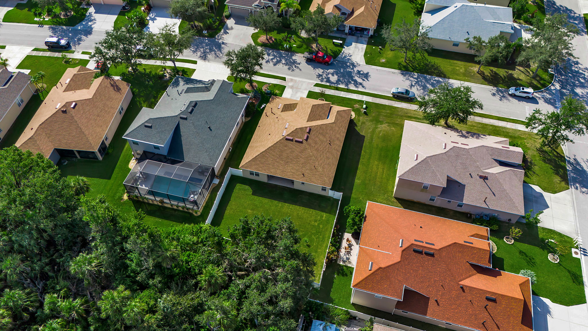 6106 34th Court East Bradenton, FL 34203 - Photo 66 of 69 an aerial view of a house with a yard and lake view