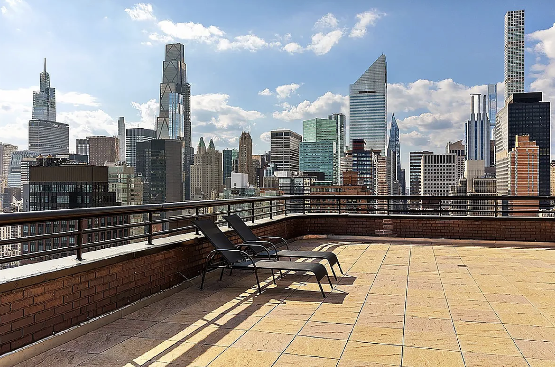 415 East 54th Street, Unit 6D Manhattan, NY 10022 - Photo 13 of 18 a view of a terrace with wooden floor