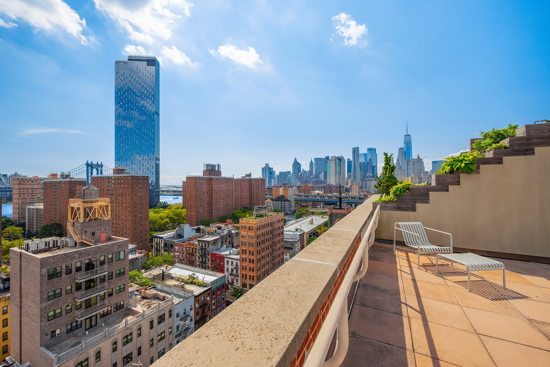 175 East Broadway, Unit 4C Manhattan, NY 10002 - Photo 12 of 14 a view of a city with tall buildings
