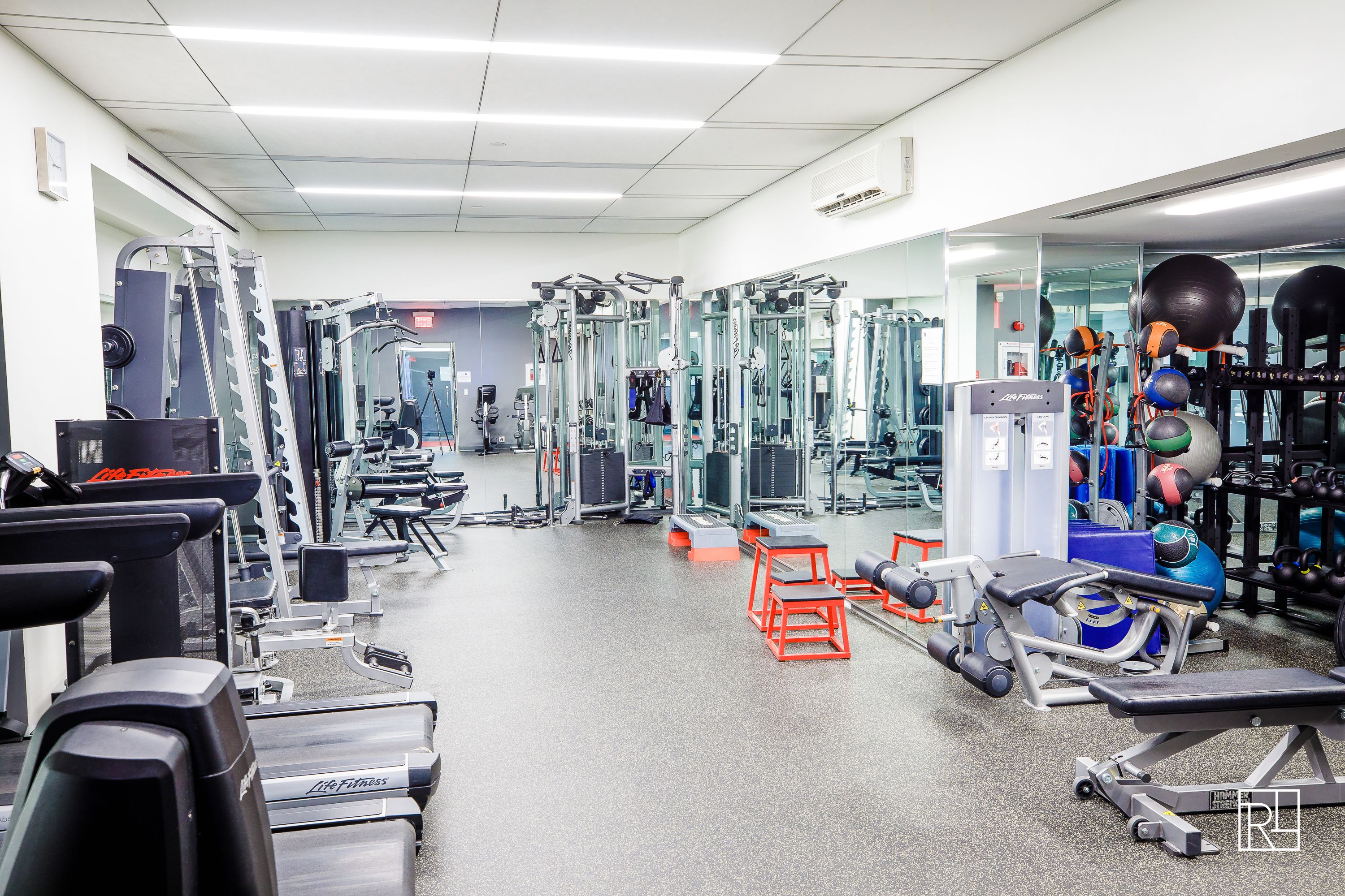 161 West 61st Street, Unit 12D Manhattan, NY 10023 - Photo 12 of 15 a view of a room with gym equipment