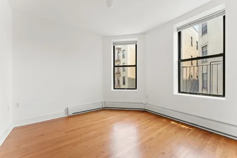 an empty room with window