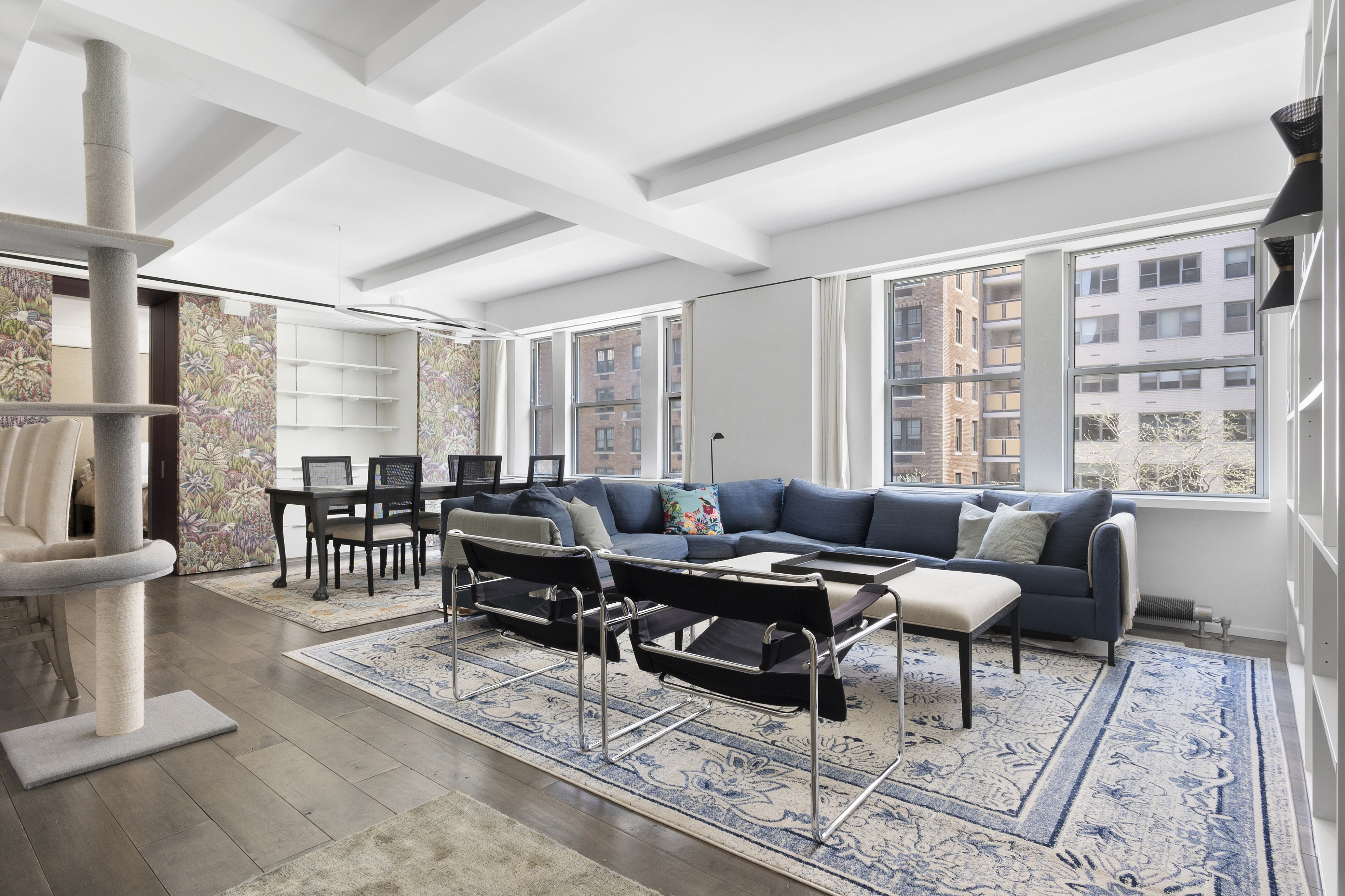 20 West 72nd Street, Unit 500 Manhattan, NY 10023 - Photo 1 of 12 a living room with furniture and a window