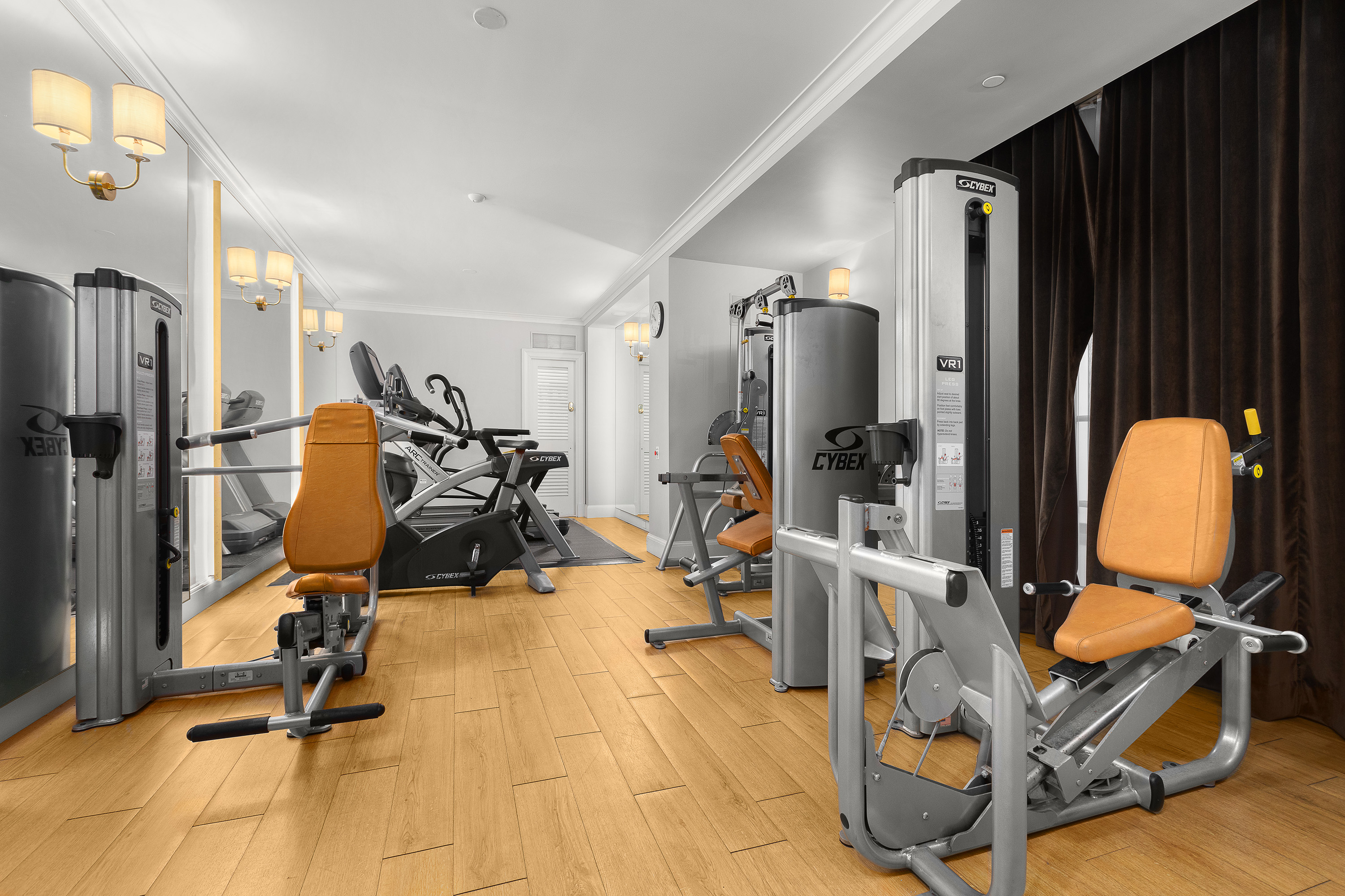 1088 Park Avenue, Unit 15C Manhattan, NY 10128 - Photo 23 of 26 a view of a room with gym equipment