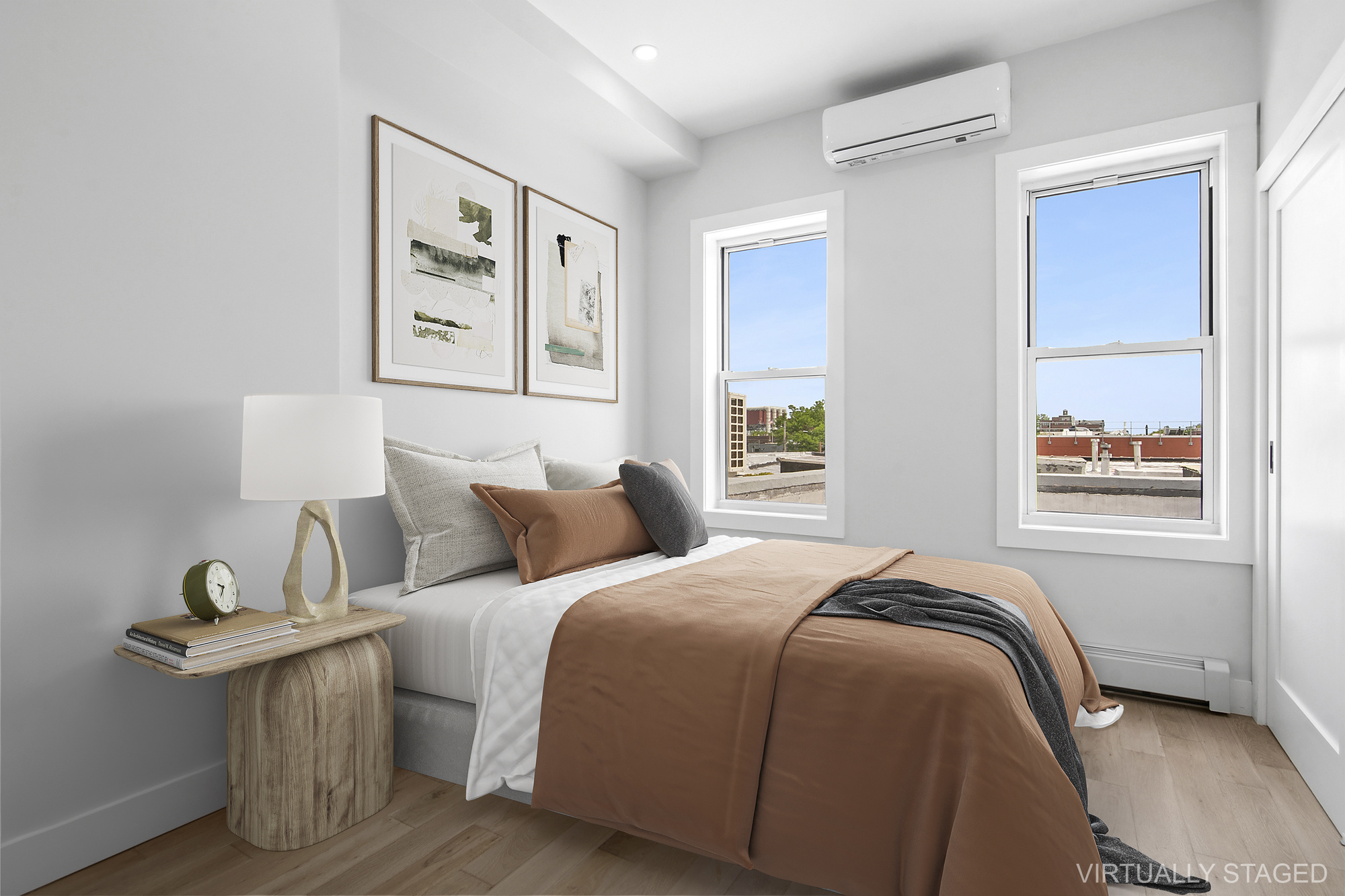 41-05 20th Avenue Queens, NY 11105 - Photo 5 of 20 a bedroom with a bed and a window