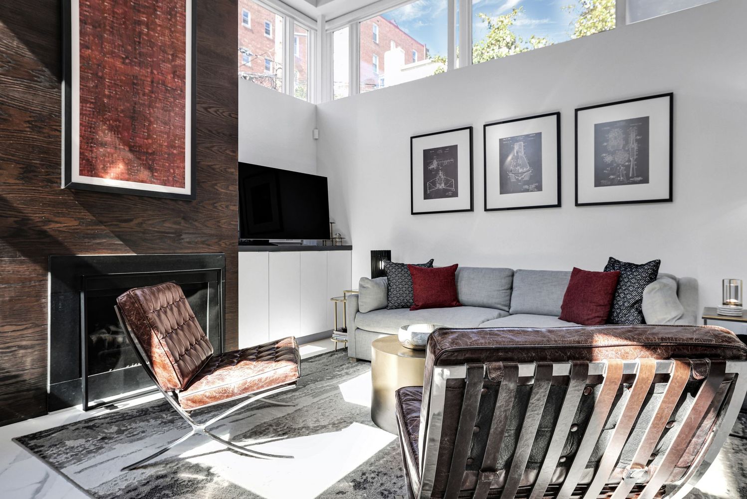 1630 19th Street Northwest, Unit C Washington, DC 20009 - Photo 7 of 45 a living room with furniture a flat screen tv and a fireplace