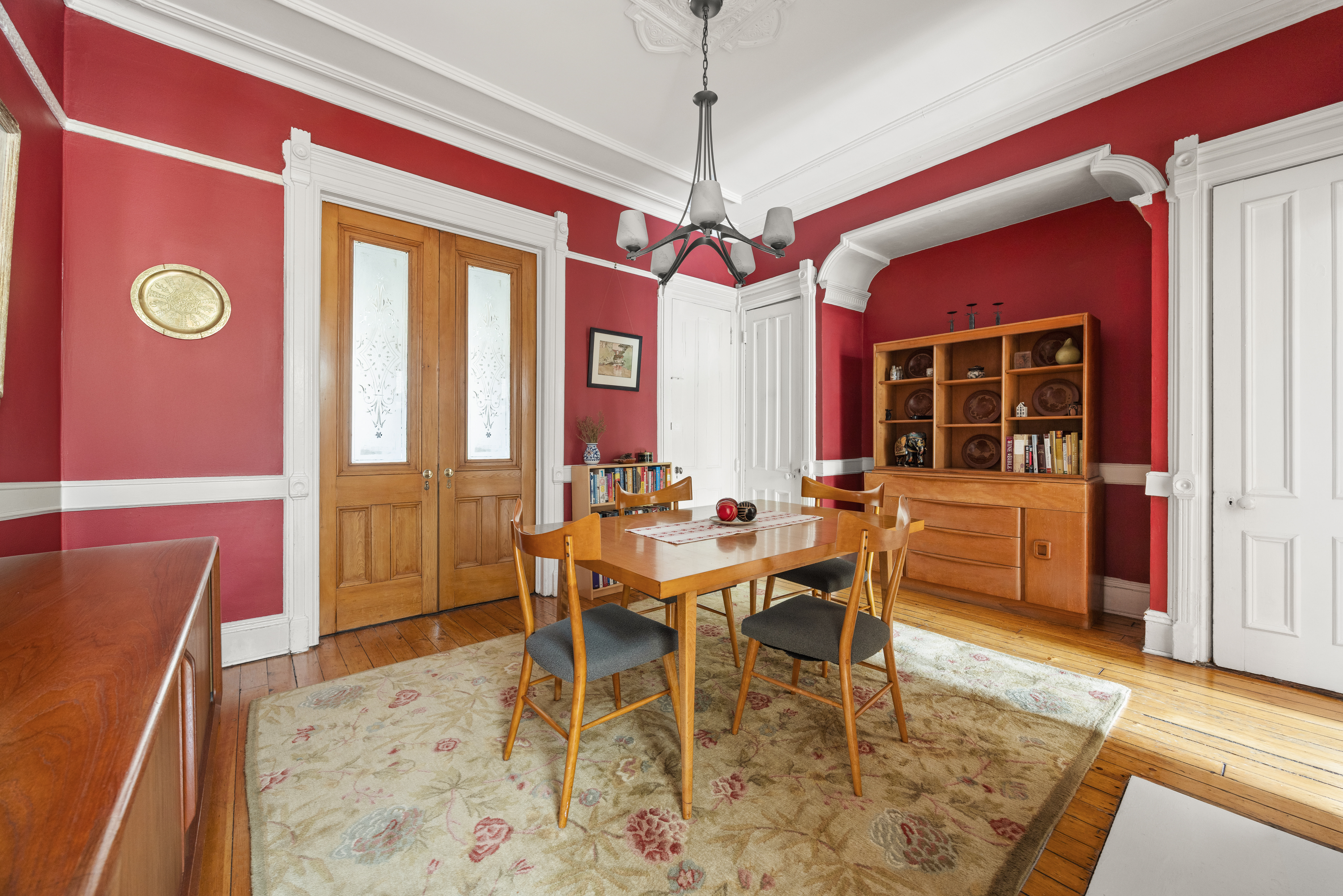 482 11th Street Brooklyn, NY 11215 - Photo 6 of 24 a dining room with a table and chairs