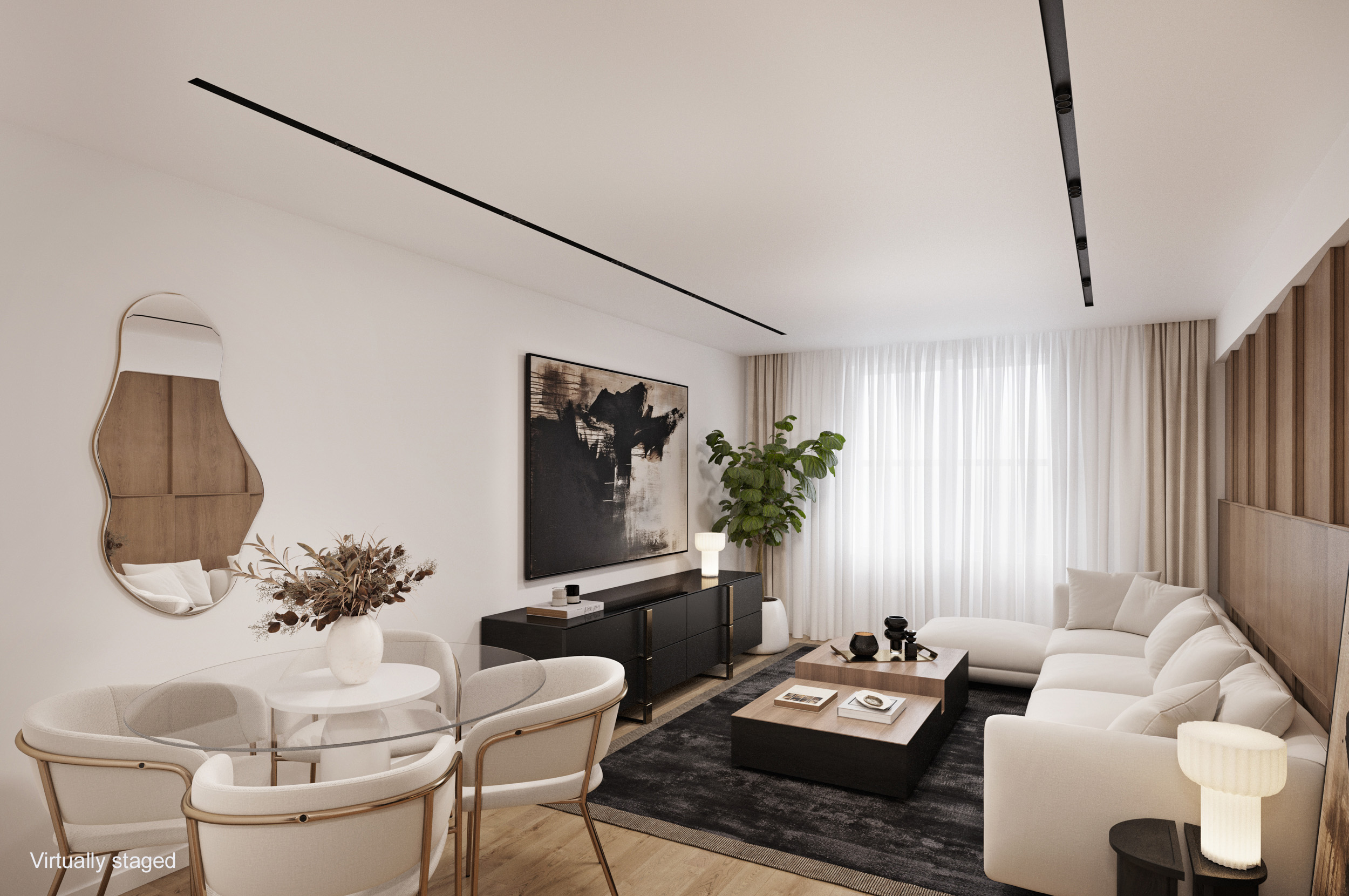 a living room with furniture and a potted plant