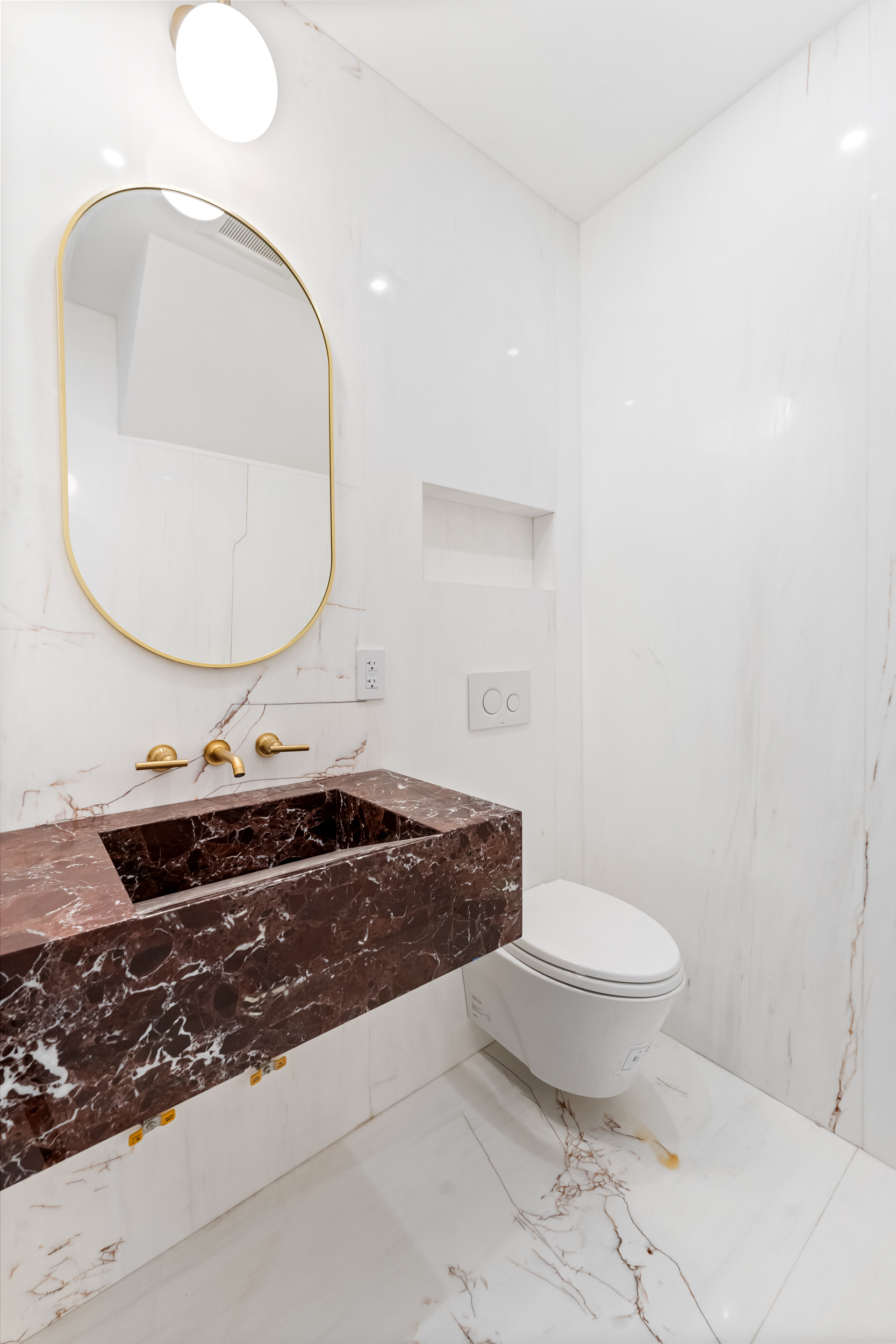 167 13th Street, Unit PH Brooklyn, NY 11215 - Photo 13 of 14 a bathroom with a granite countertop sink and a mirror