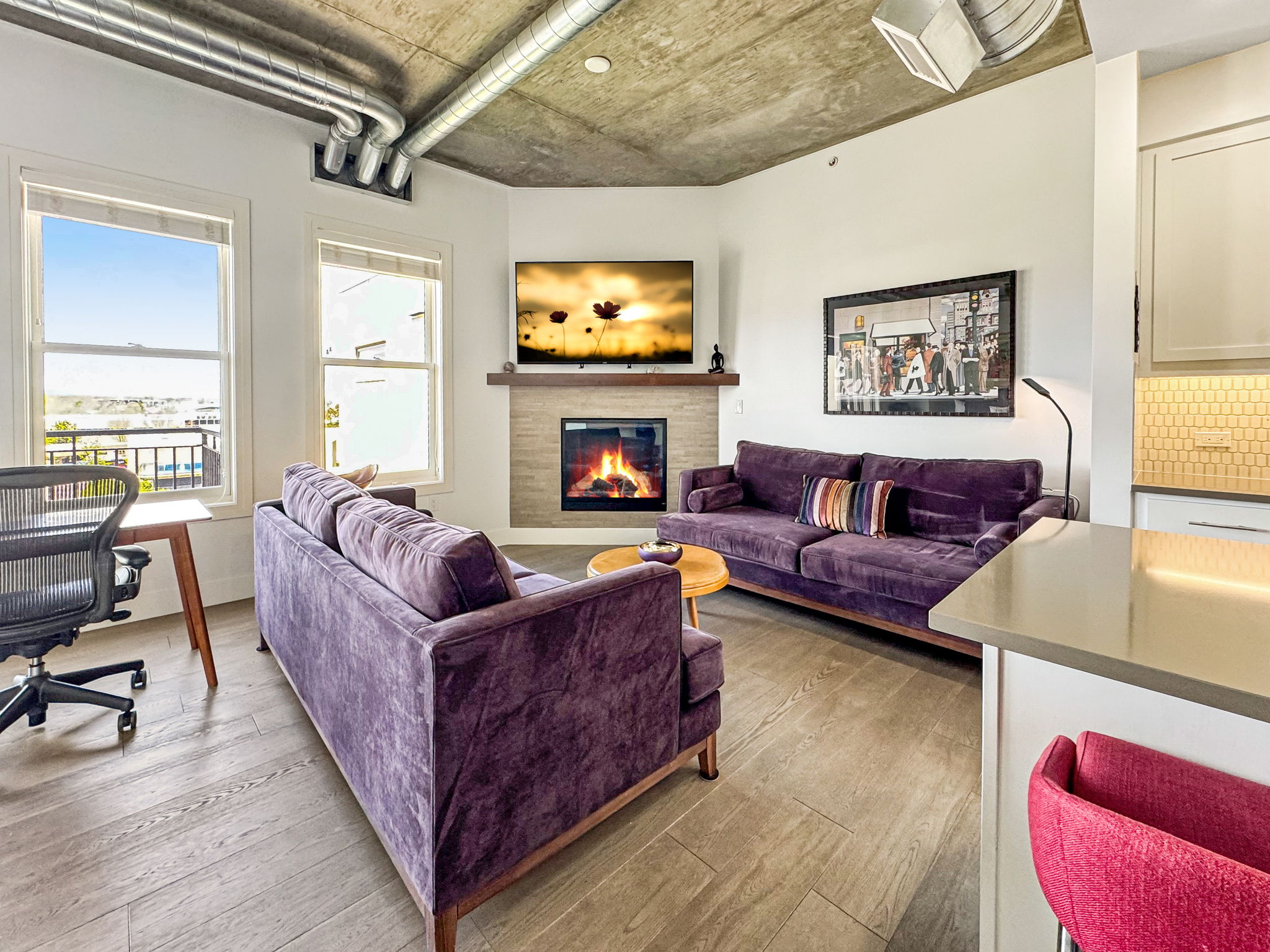 3401 Arapahoe Avenue, Unit Undisclosed Boulder, CO 80303 - Photo 4 of 28 a living room with furniture and a fireplace
