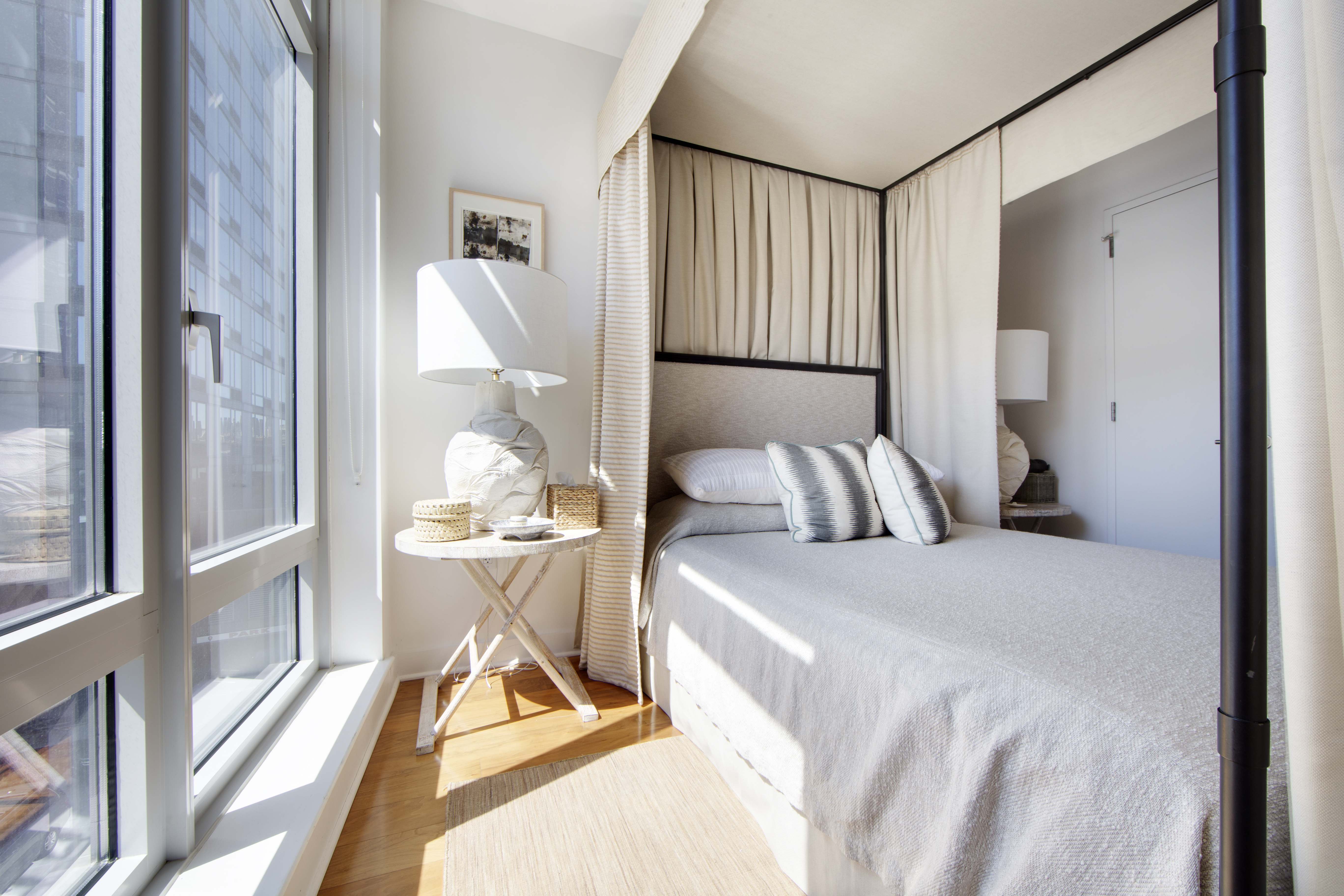 2 Northside Piers, Unit 4B Brooklyn, NY 11249 - Photo 9 of 18 a view of a bedroom with a bed and glass door